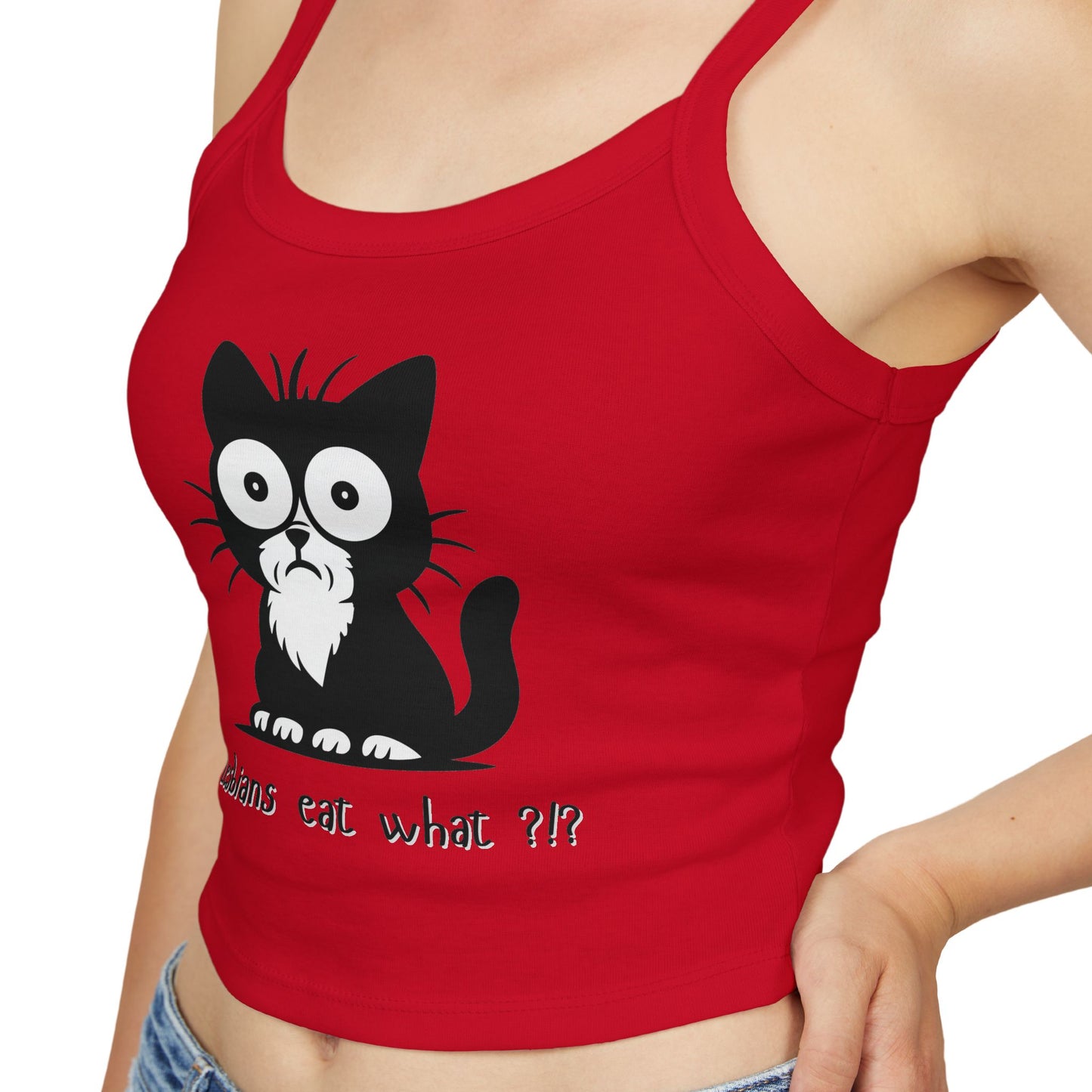 Close-up detail of stunned black-and-white cat face and "Lesbians Eat What?!?" text on red tank