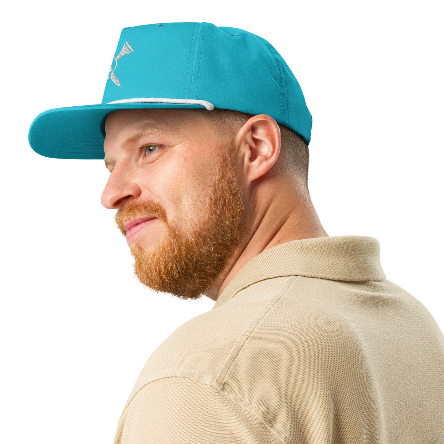 Left profile of grinning bearded model in turquoise golf rope cap, white semi-curved bill