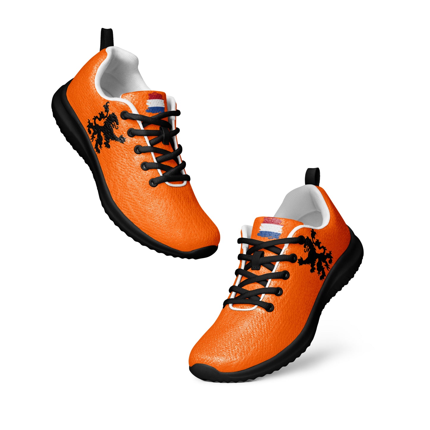 Dynamic float of orange lace-up sneakers with prominent black lion rampant and Dutch flag accents on flyknit upper