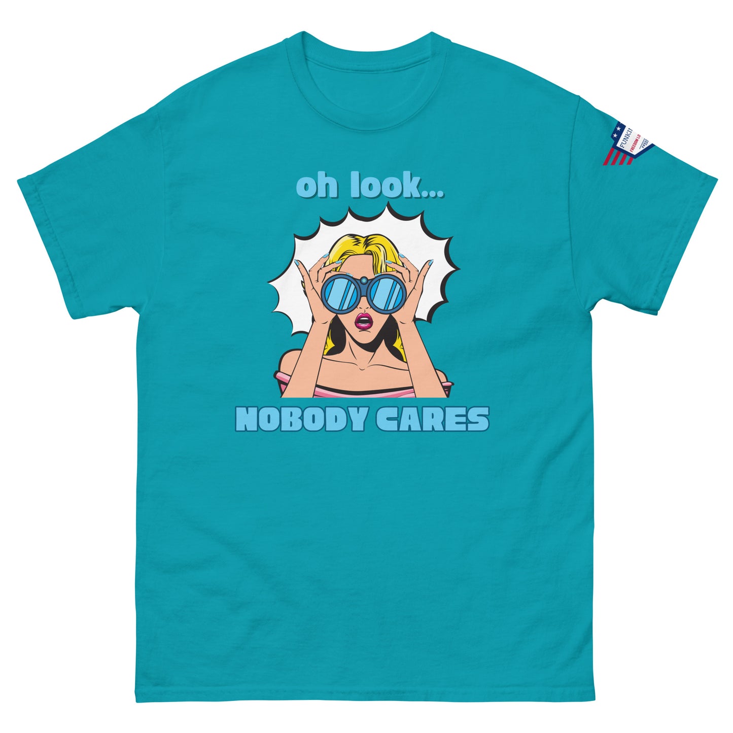 Front view of teal unisex t-shirt with "oh look... NOBODY CARES" pop art sunglasses woman and flag sleeve patch