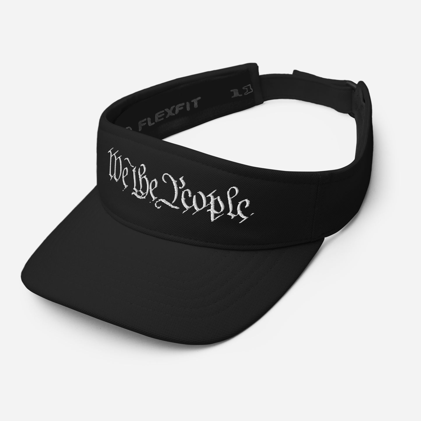 Angled front view of black visor emblazoned with white "We The People" script, Flexfit details on sides