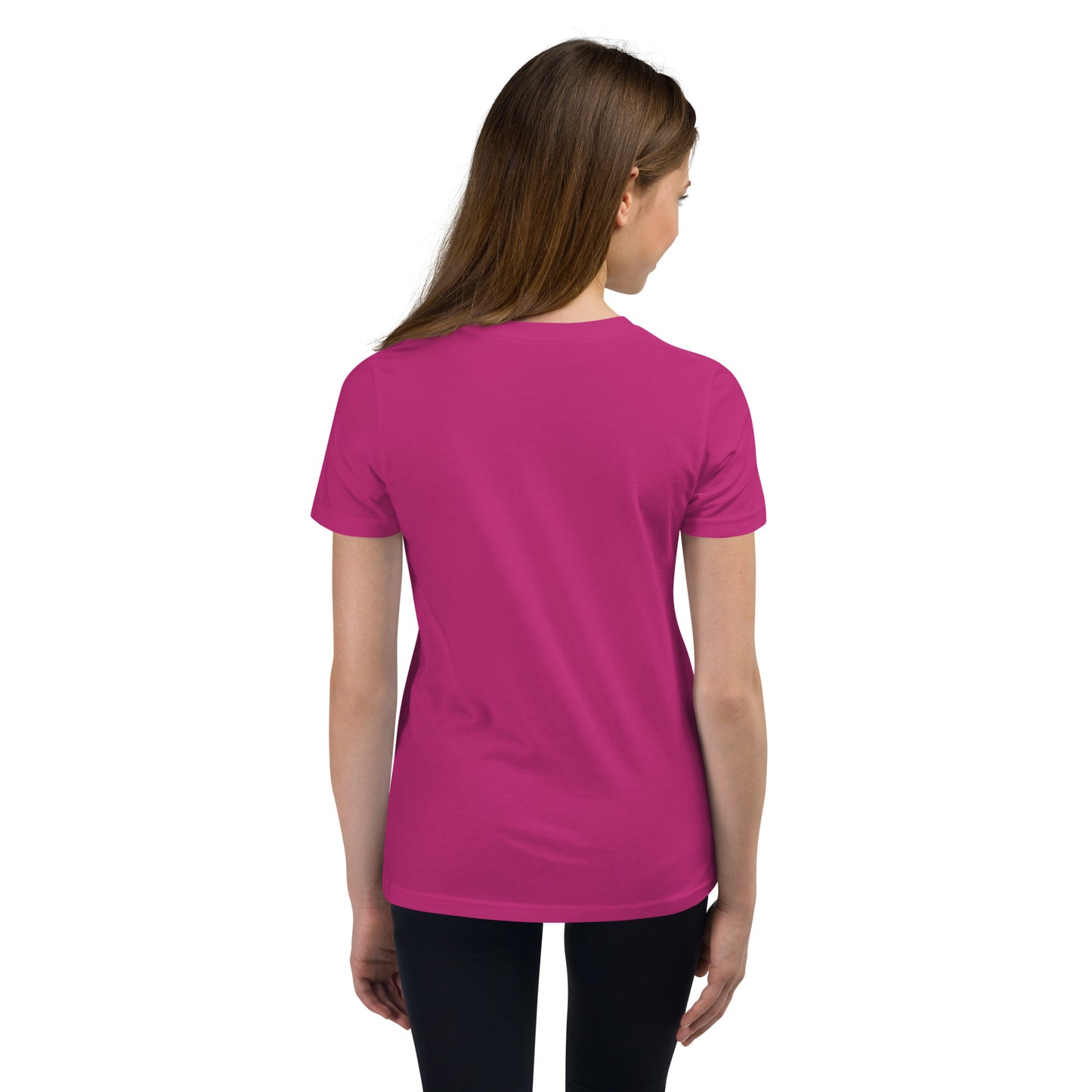 Back of hot pink youth t-shirt on smiling teen model — no print, all effortless cool