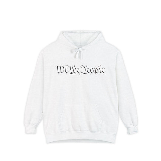 Front view of white unisex hoodie with black cursive "We the People" script, hood down and ready for patriotic chills