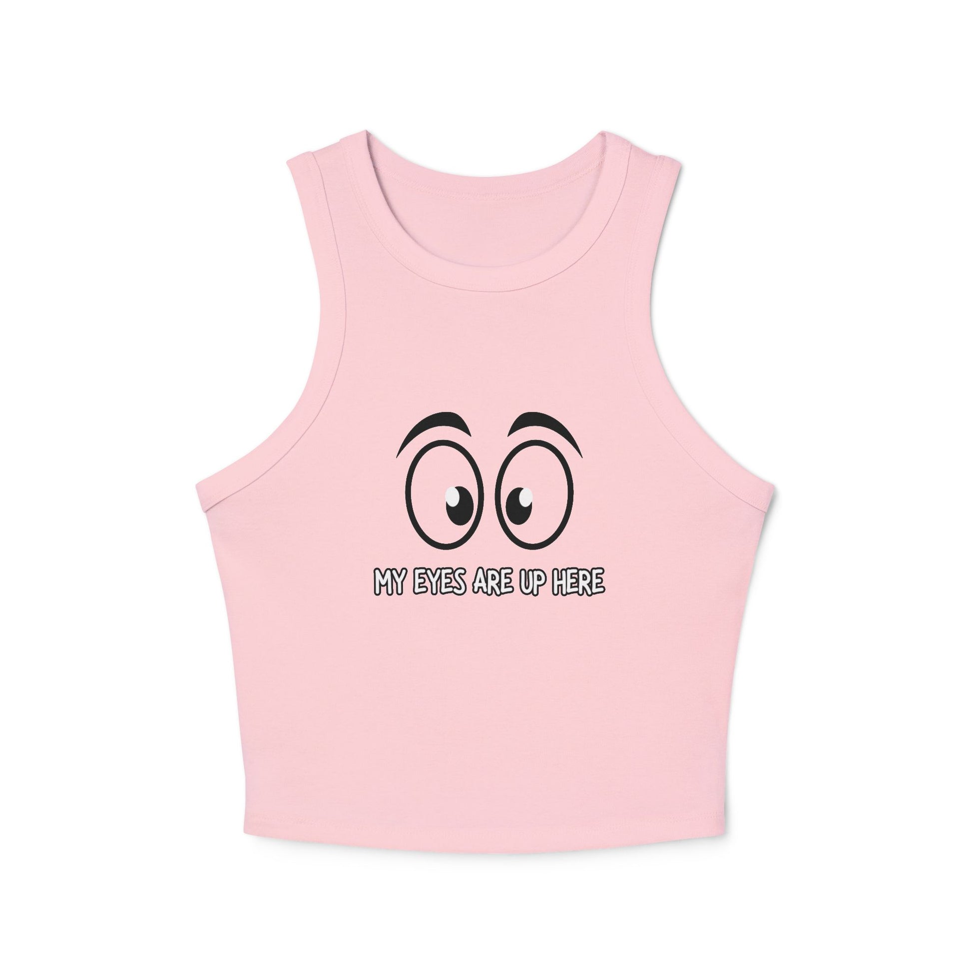 Close front view of solid pink racerback crop tank with black cartoon eyes and "My Eyes Are Up Here" text