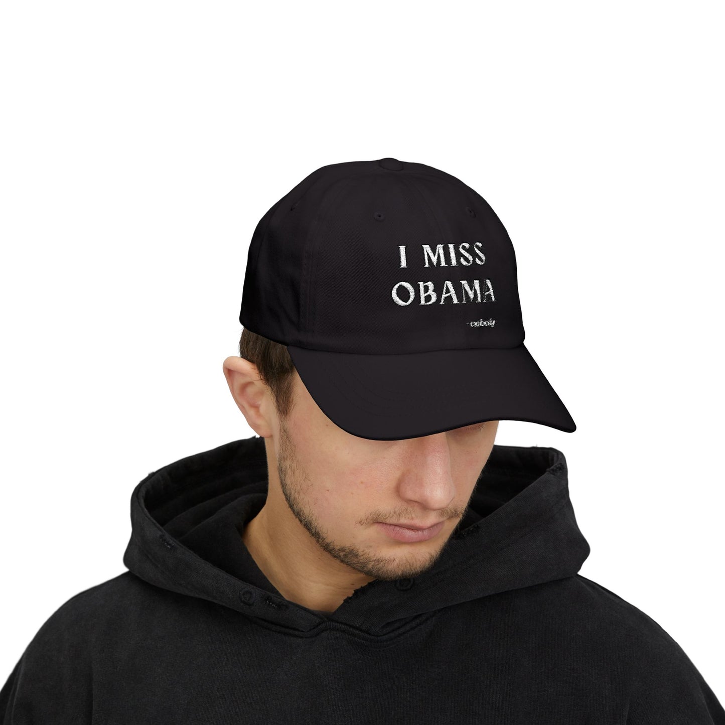 Back view navy unstructured dad hat with brass buckle adjustable strap