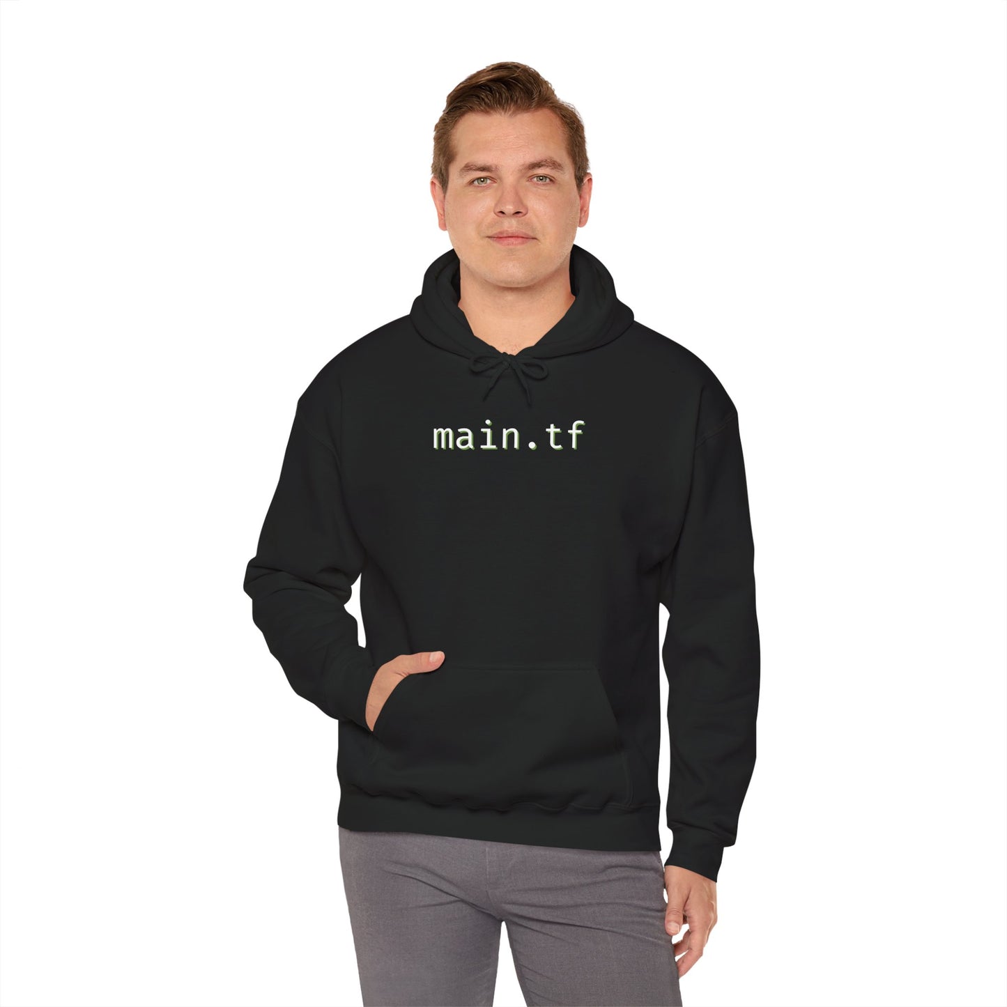 Curly-haired guy rocking front view of black "main.tf" pullover hoodie