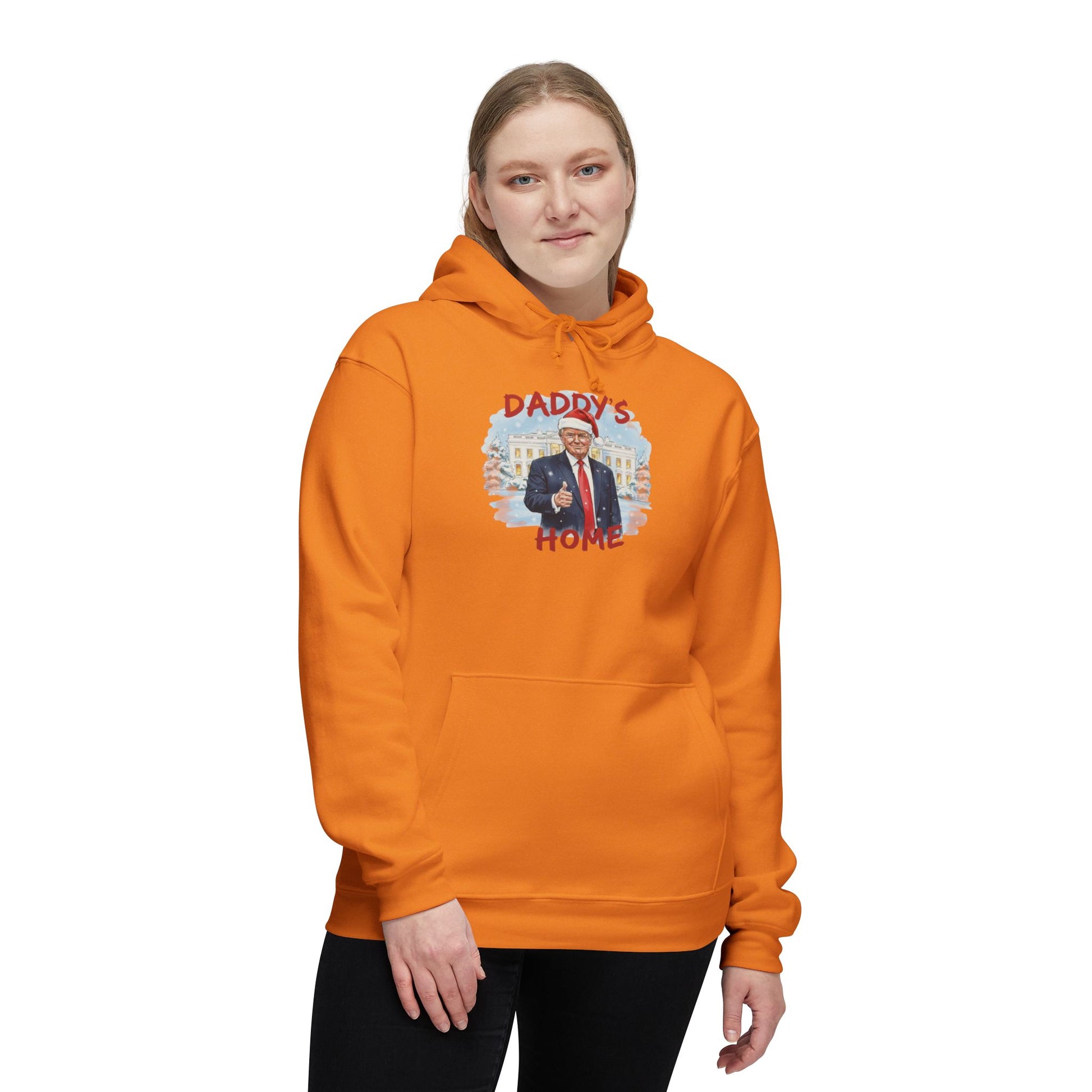 Woman sporting bright orange Trump "Daddy's Home" hoodie front with holiday White House flair