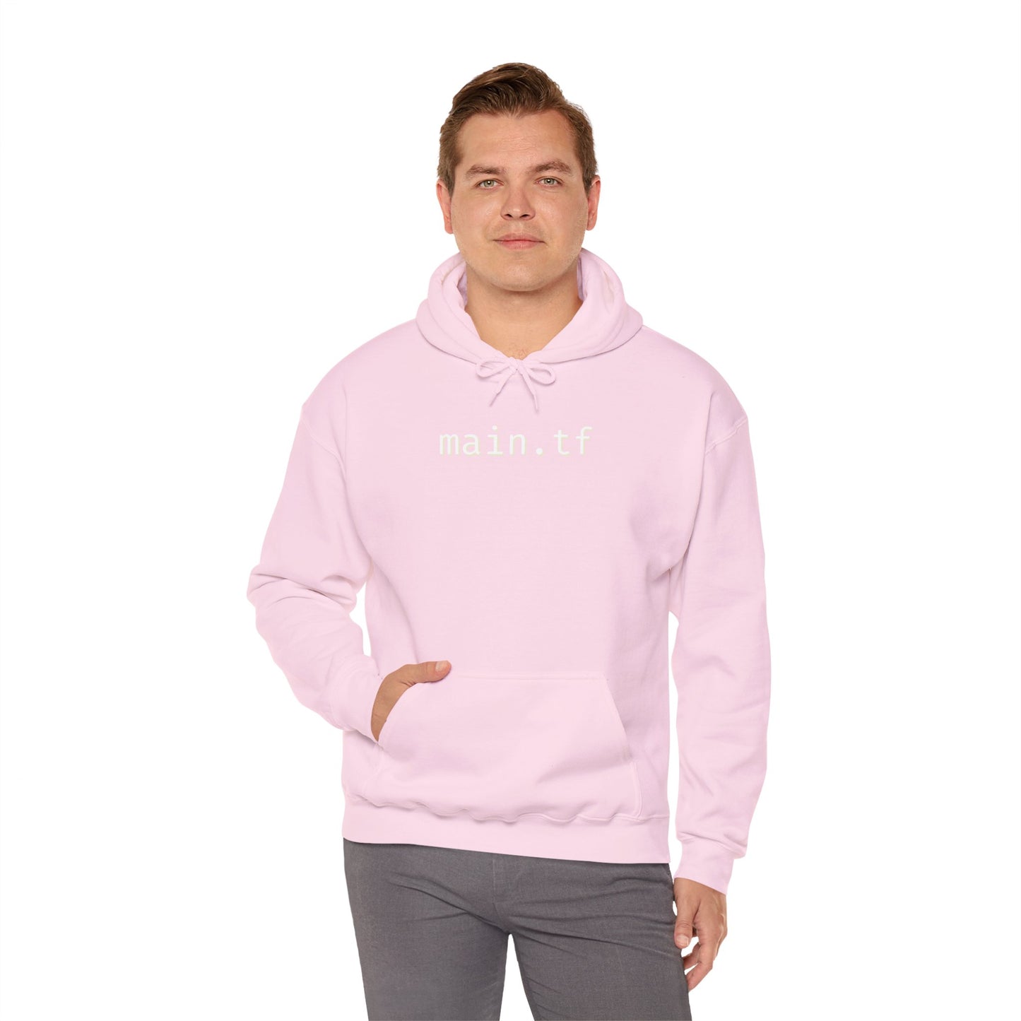 Male model front view in light pink hoodie with white "main.tf" print