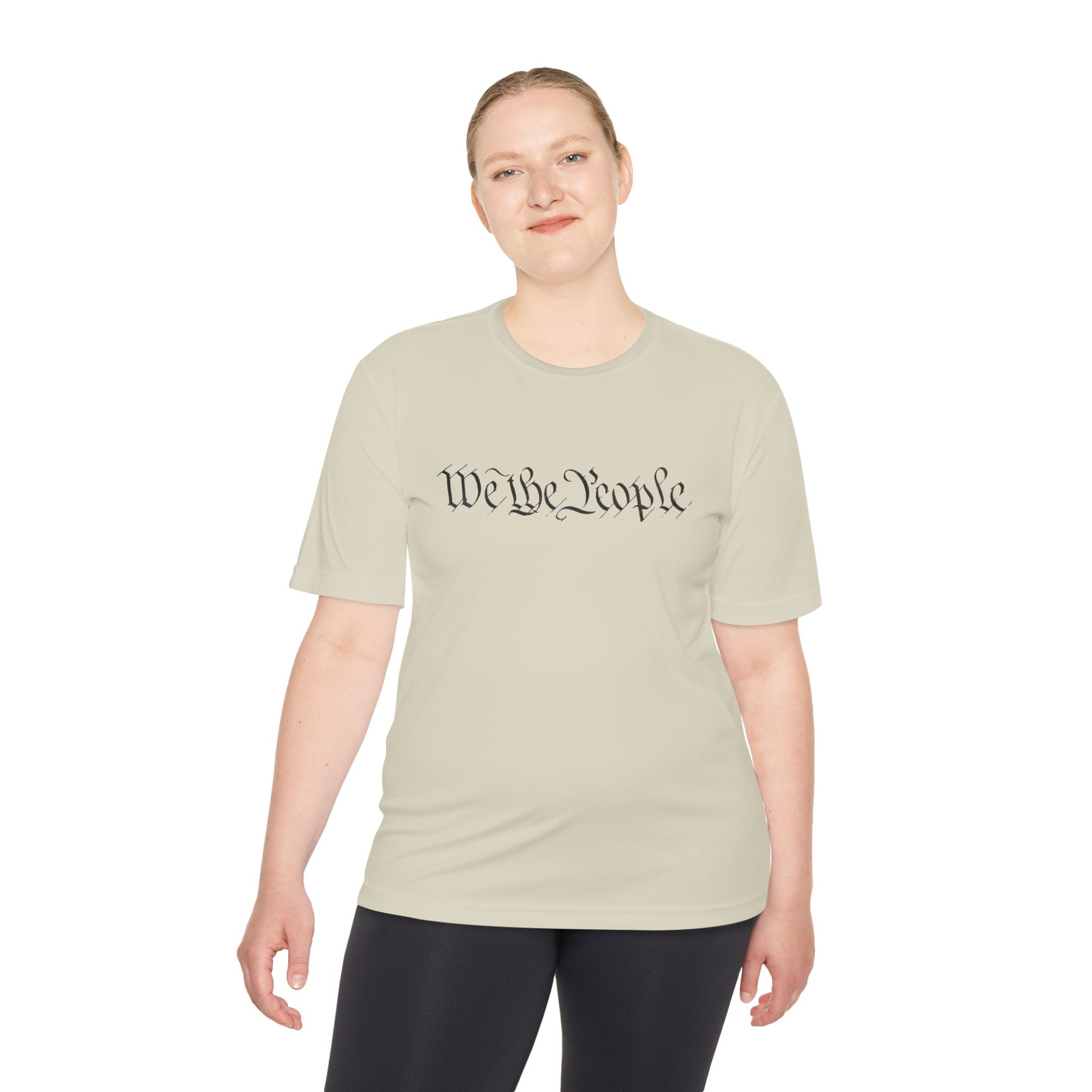 Woman modeling cream tee front, black cursive "We the People" with hidden Trump dance QR