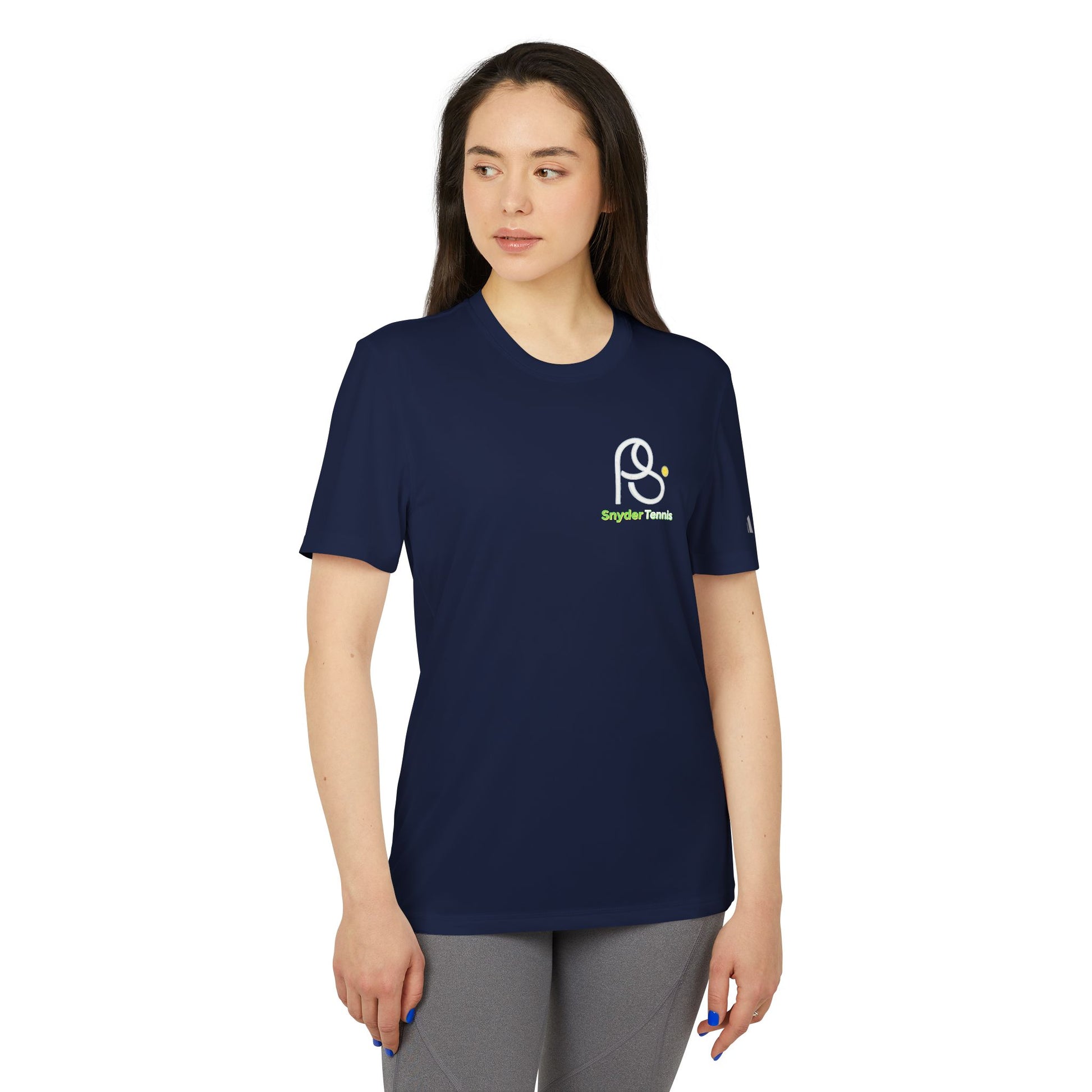 Female model front view in navy Coach Pete Snyder performance tee, subtle white HT tennis logo with green racket on sleeve