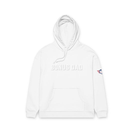 Front view of white Bonus Dad relaxed hoodie with embossed "BONUS DAD" and small American flag sleeve patch