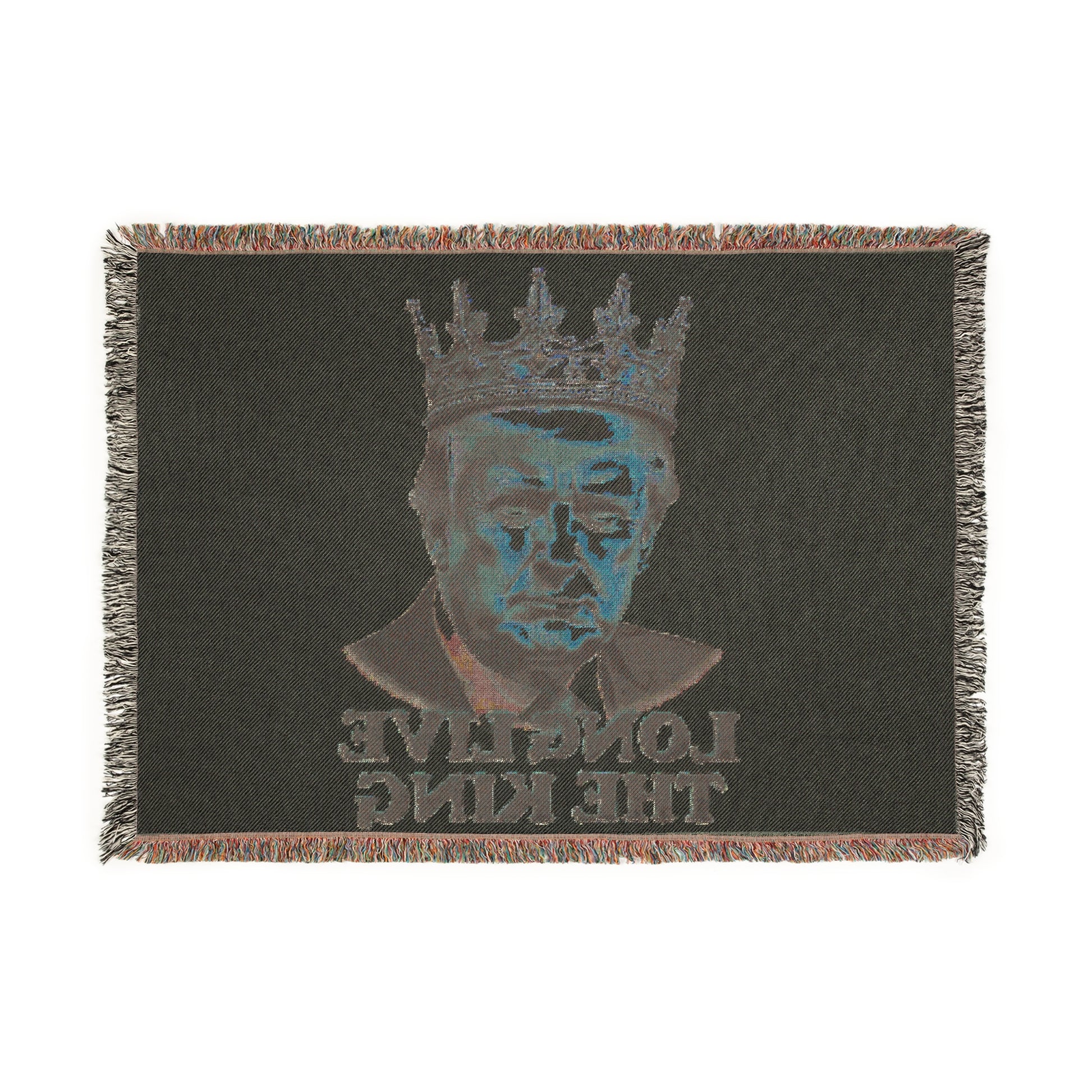 Dark woven blanket reverse with cyan-toned crowned Trump, mirrored 'LONG LIVE THE KING' text, gold crown accents, colorful fringes