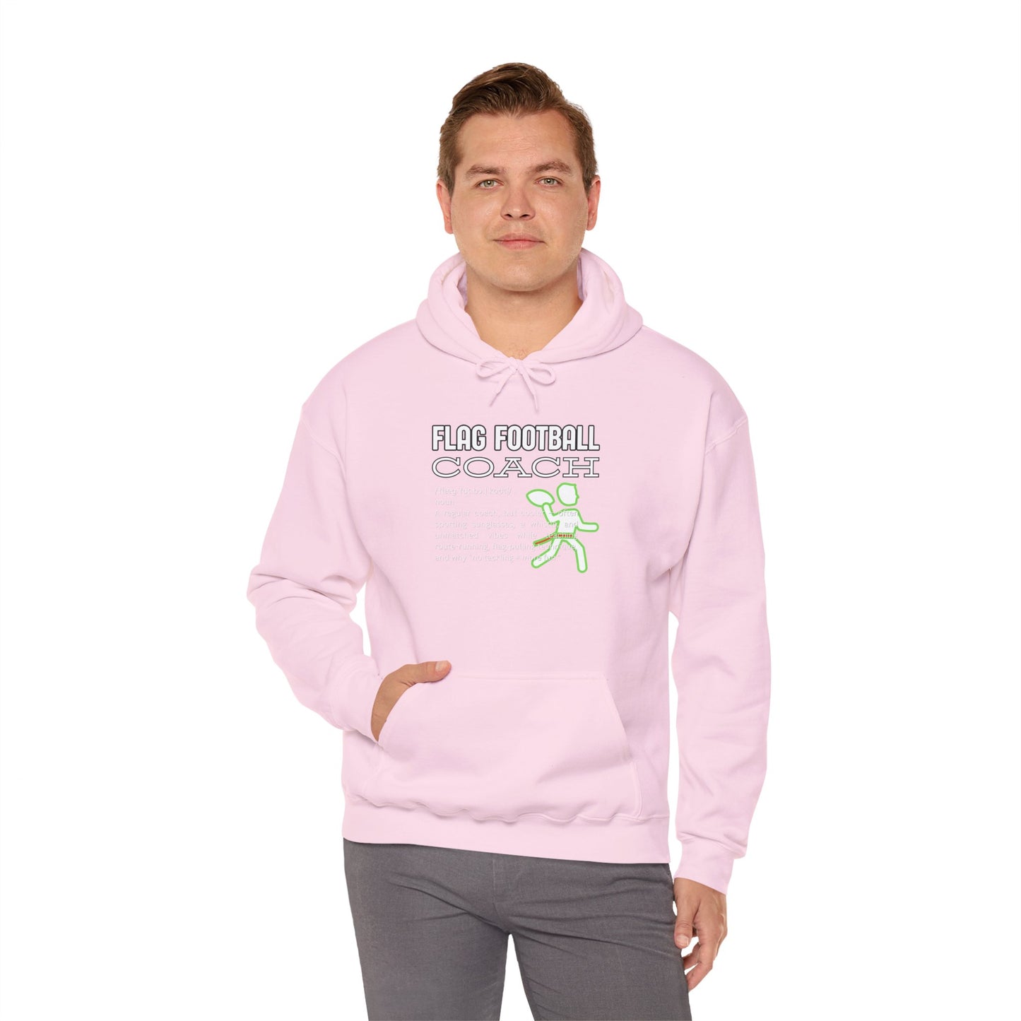 Male model in light pink Flag Football Coach hoodie, front view with witty white print and green accents
