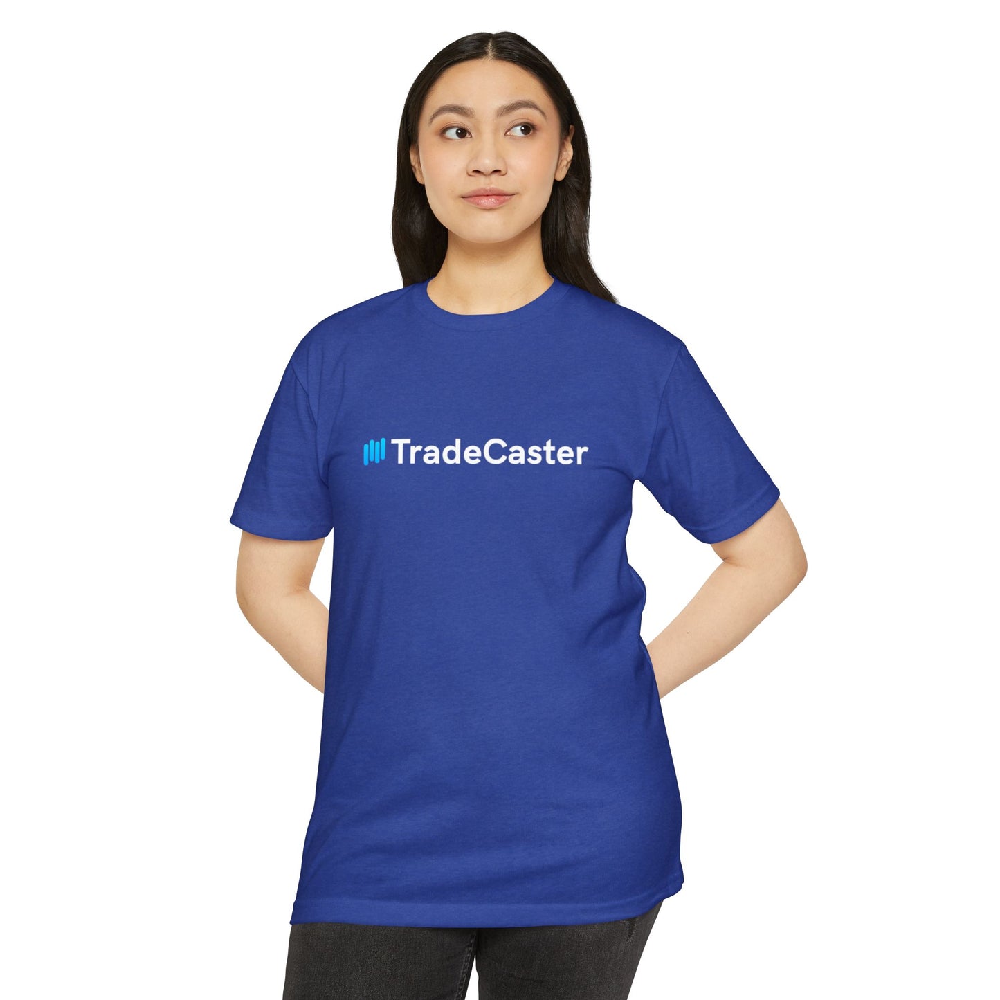 Woman clasps hands in front view of royal blue TradeCaster tee, white logo shines