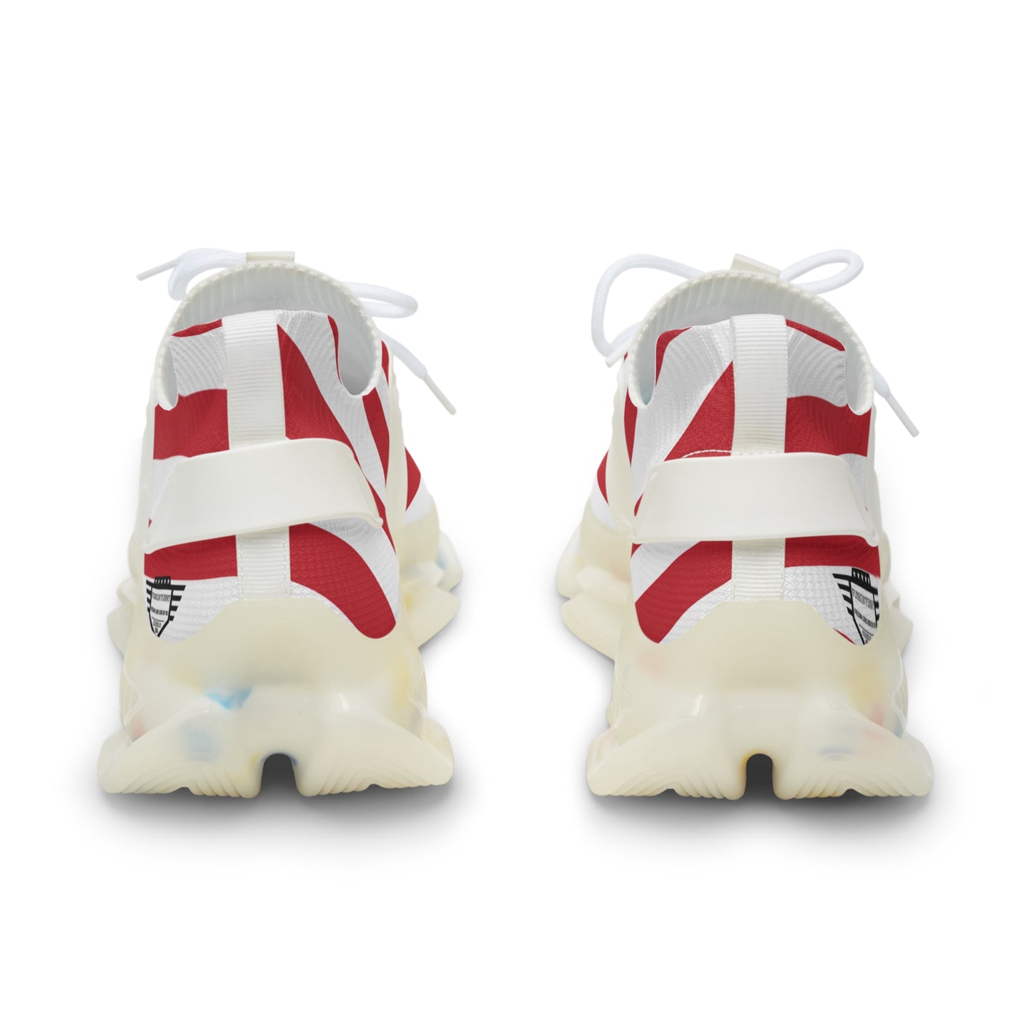 Rear view of USA flag mesh sneakers pair, white laces & heel pull, flag stripes, clear chunky sole with specks