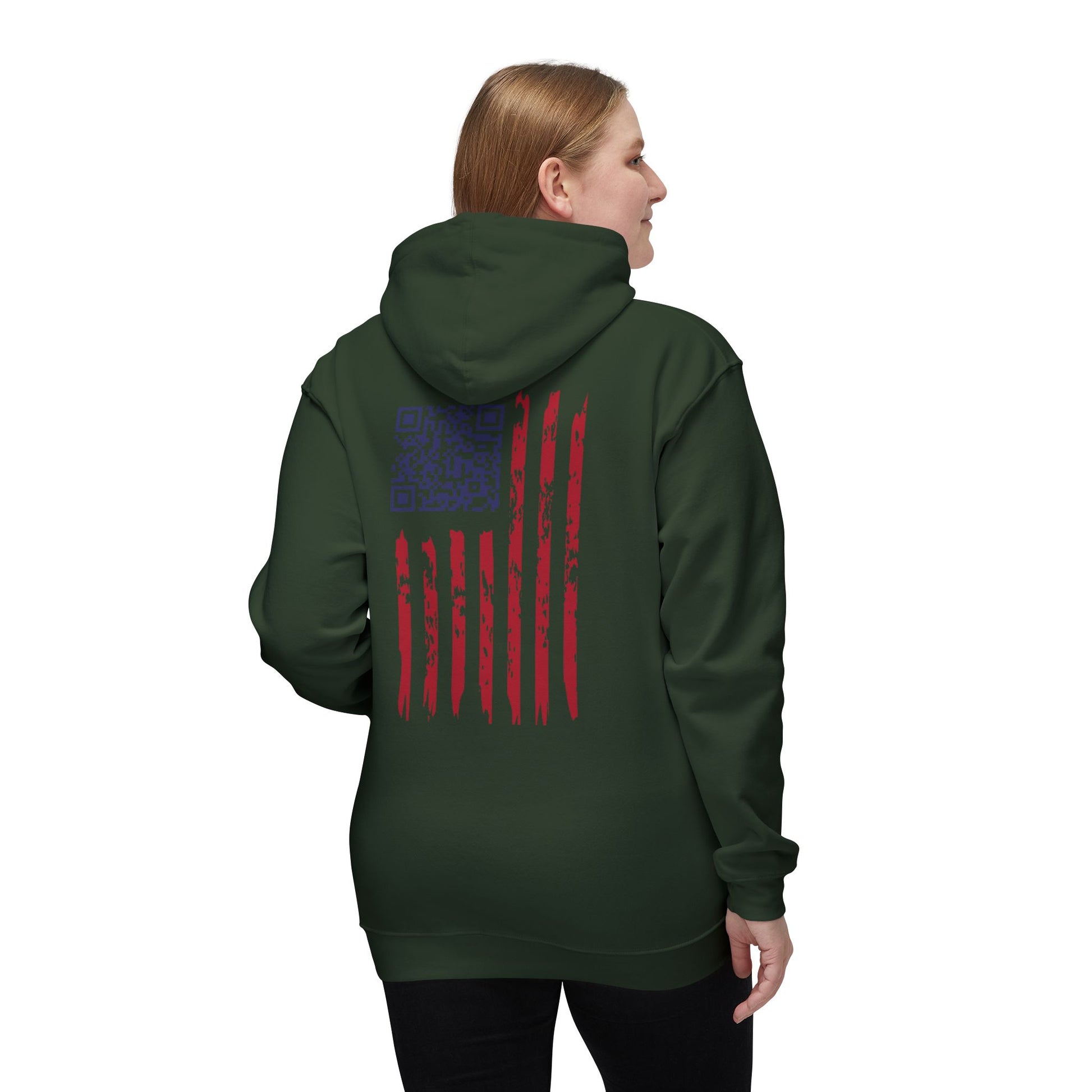 Woman’s back view in hunter green hoodie: ragged flag and QR code for Trump vibes
