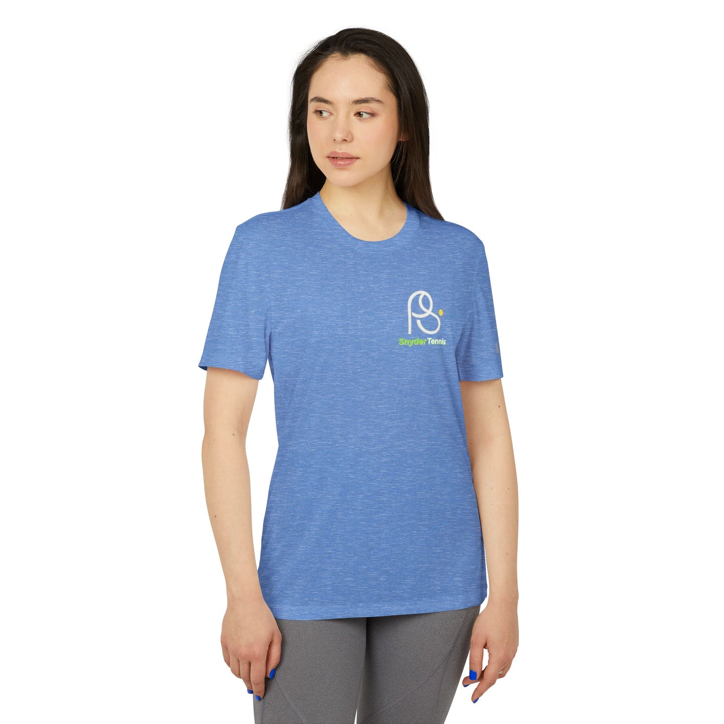 Female model in Collegiate Royal Heather Coach Pete Snyder adidas tee, front view showing white HT tennis logo with green racket on left sleeve