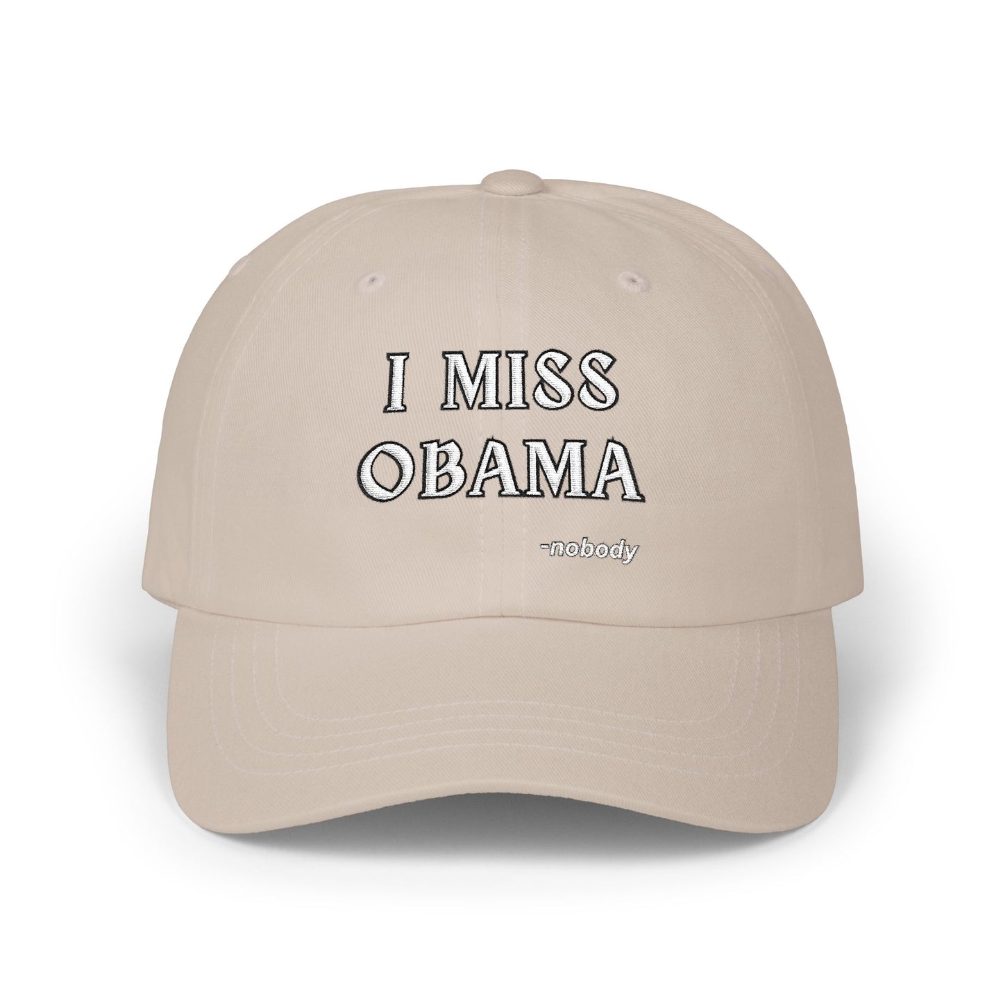 Front view of khaki dad hat featuring "I MISS OBAMA -nobody" embroidered in black outline