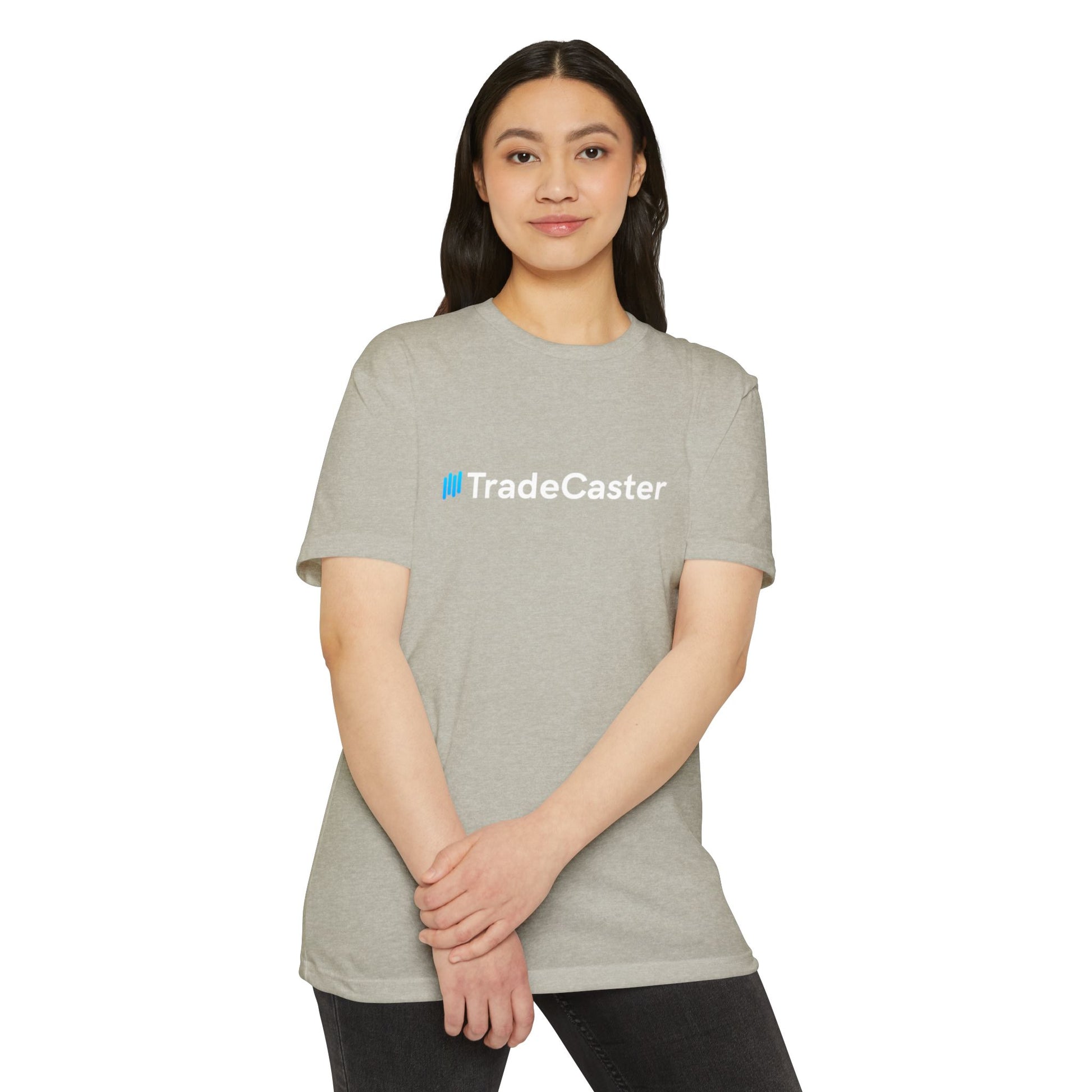 Female model in heather gray TradeCaster t-shirt front, cyan logo, crossed hands casual style