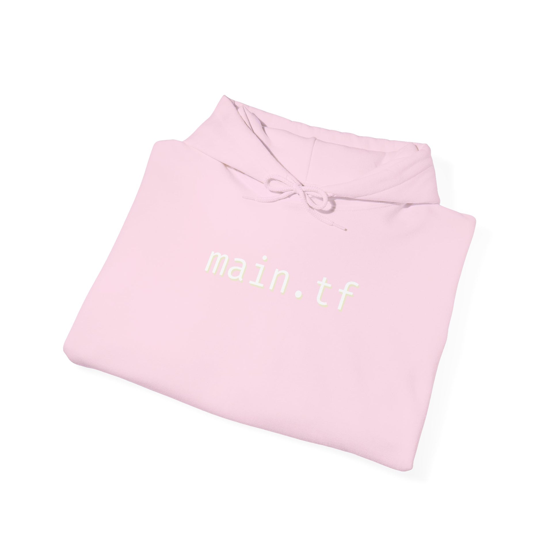 Folded front view of light pink hoodie showing bold white "main.tf" chest print