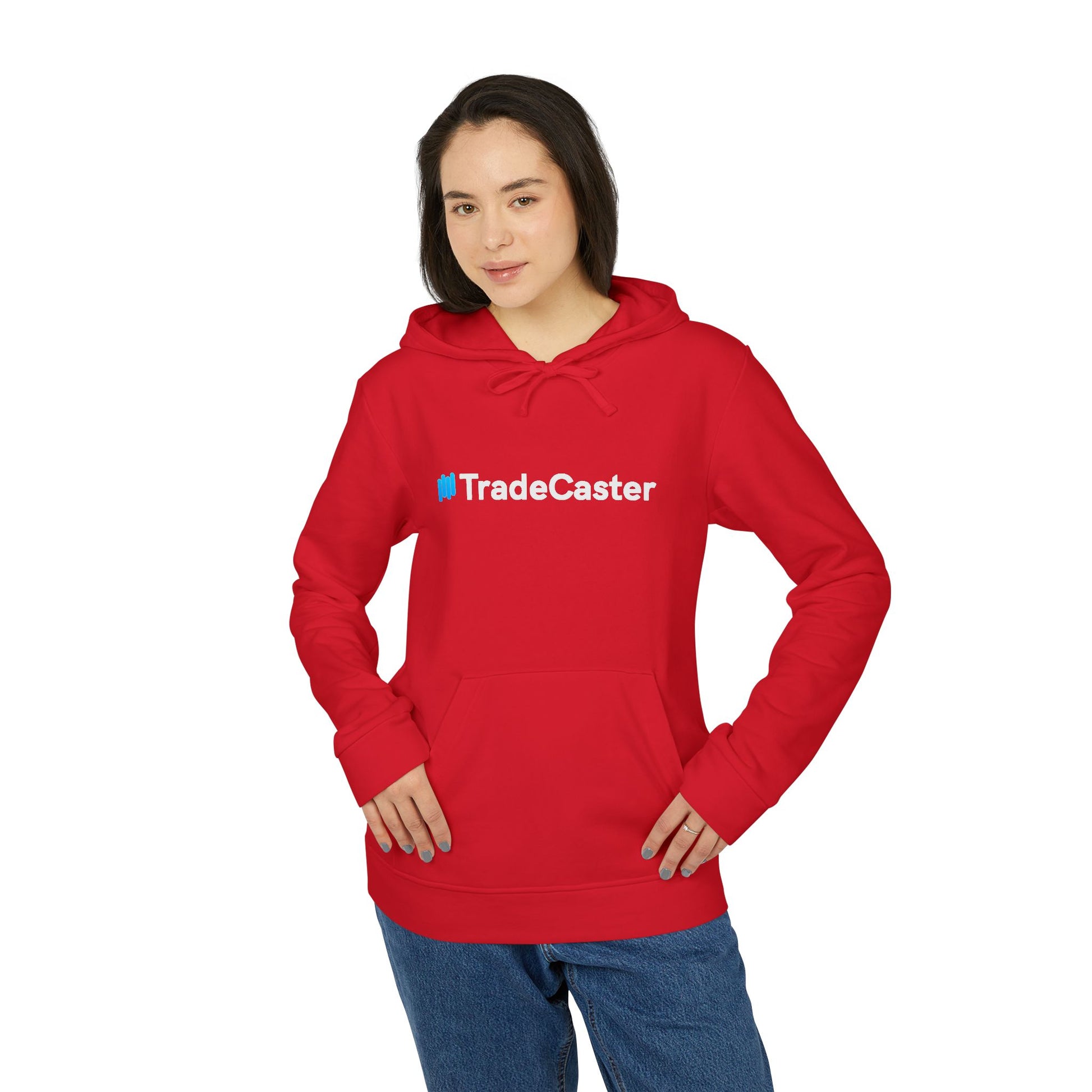 Woman front view in fiery red Adidas hoodie, white #TradeCaster logo centered, hands on hips jeans