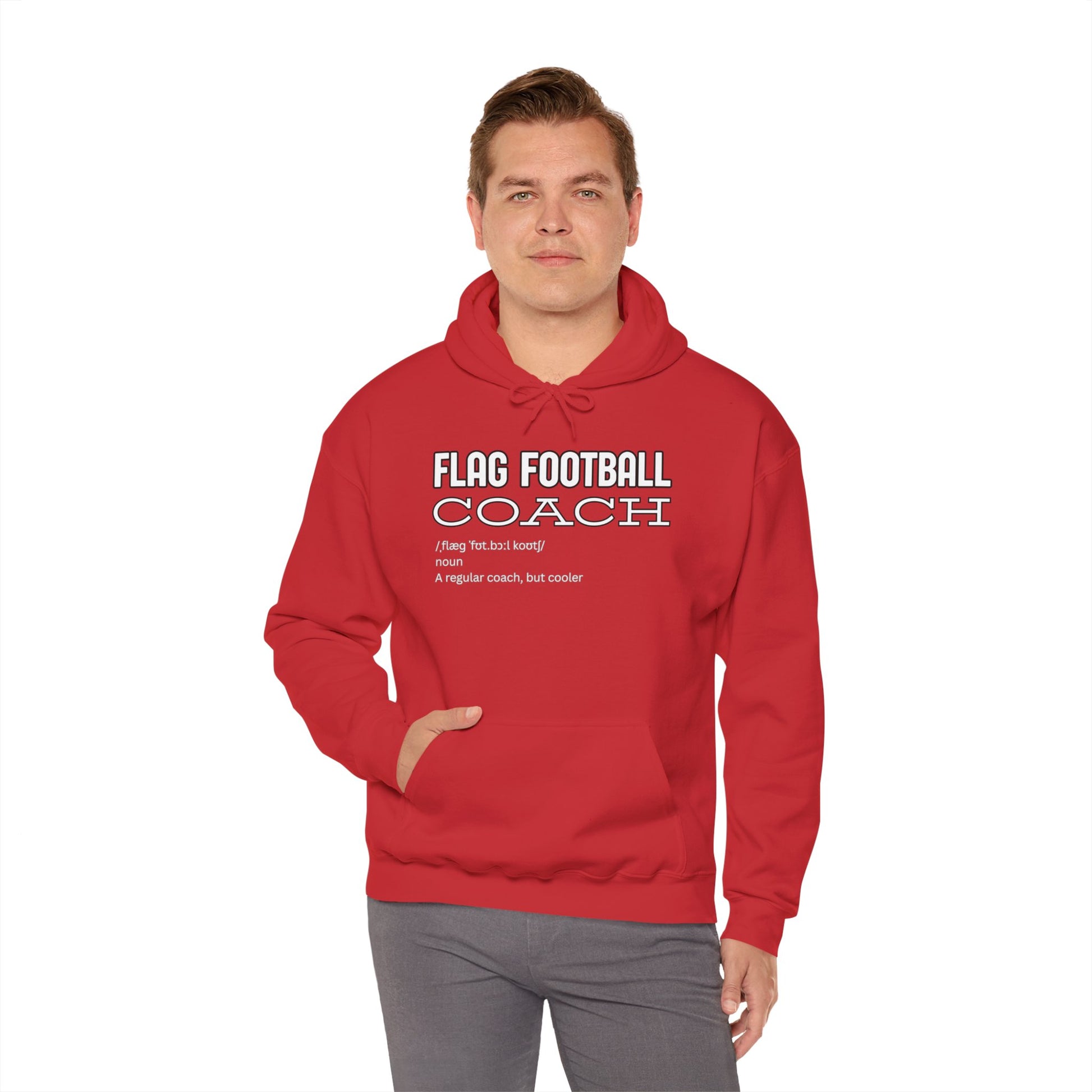 Male model in red hoodie displaying white "Flag Football Coach: A regular coach, but cooler" print