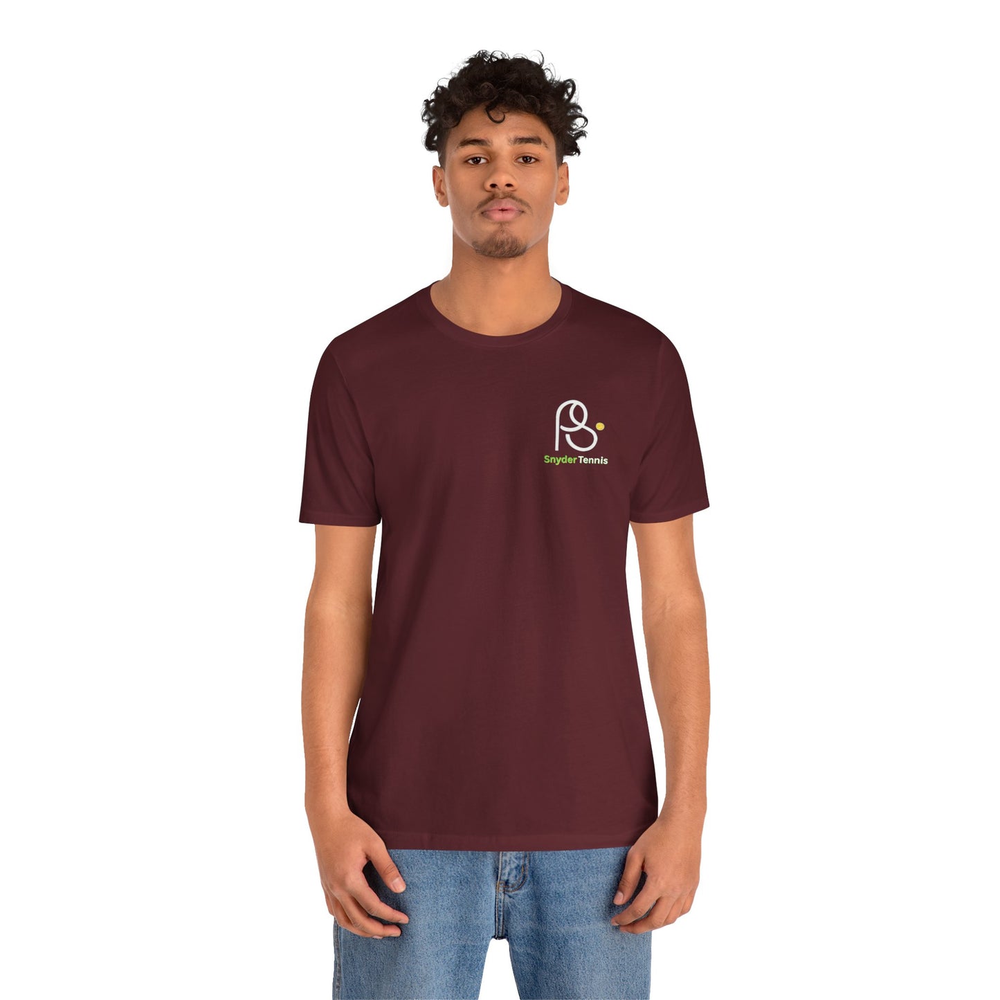Male model front in maroon tee, white PS tennis logo with "Snyder Tennis" on chest, chill jeans vibe