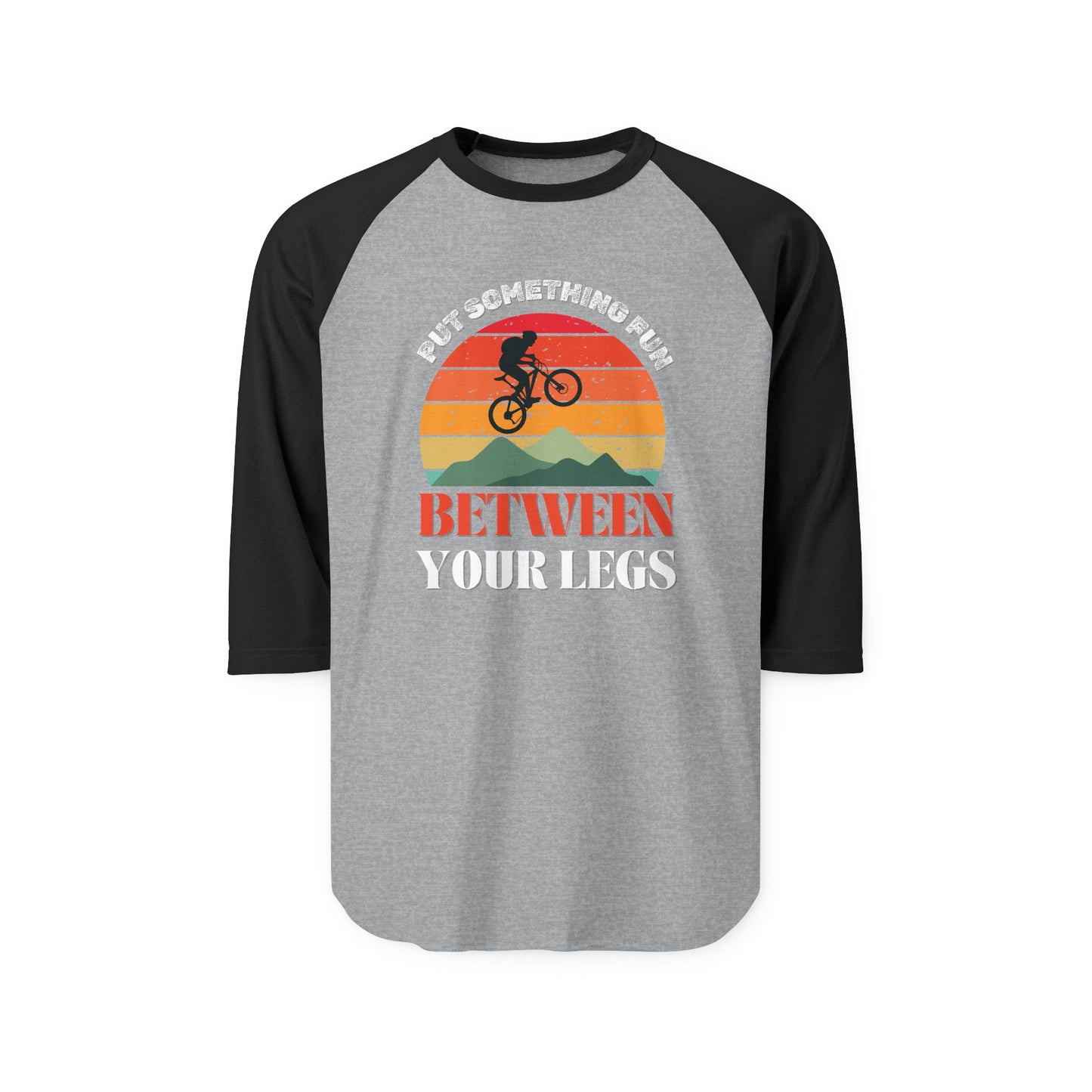 Front view of heather grey/black raglan tee flaunting "Put something fun between your legs" with jumping bike sunset art