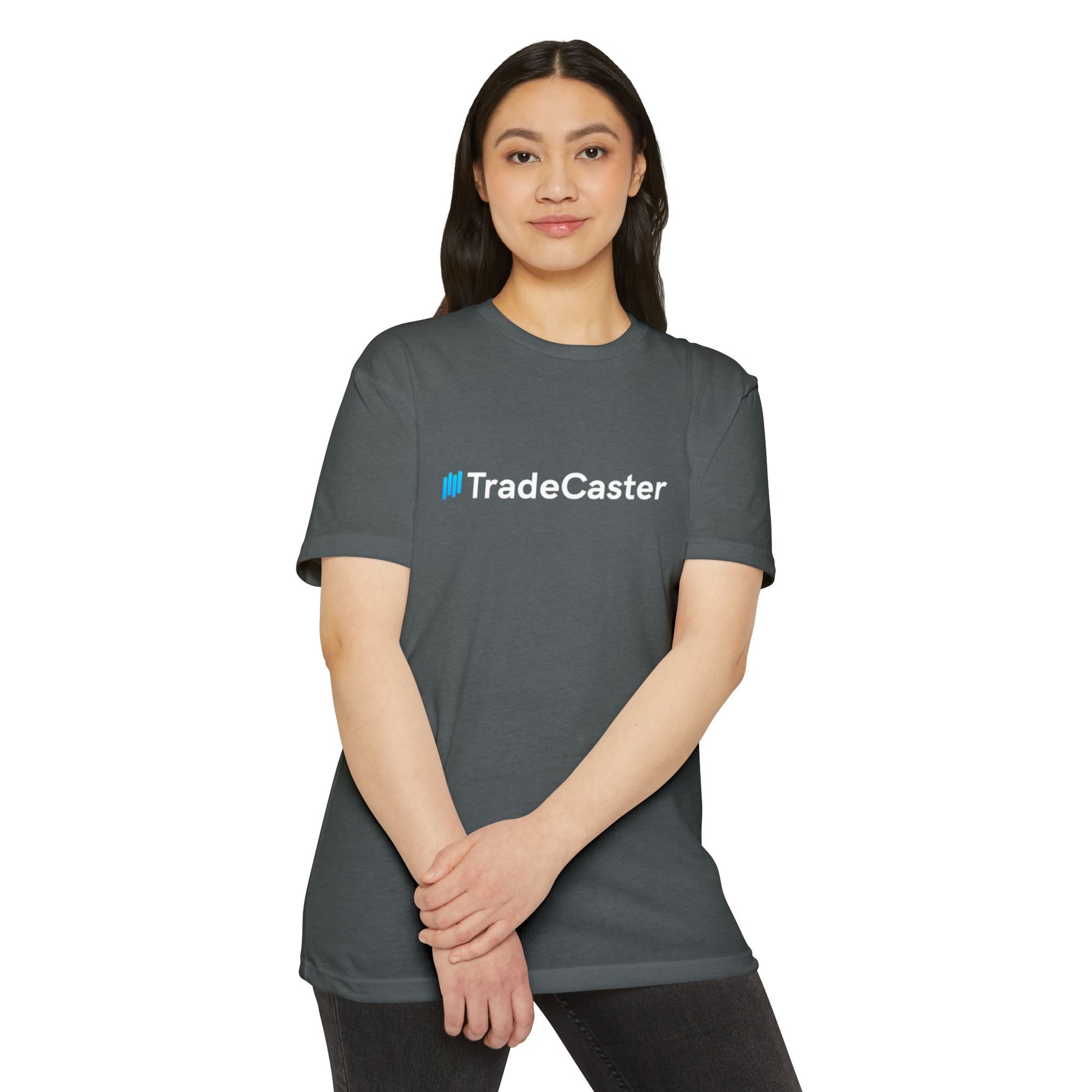 Asian woman clasps hands in front of charcoal gray TradeCaster t-shirt, blue logo crisp