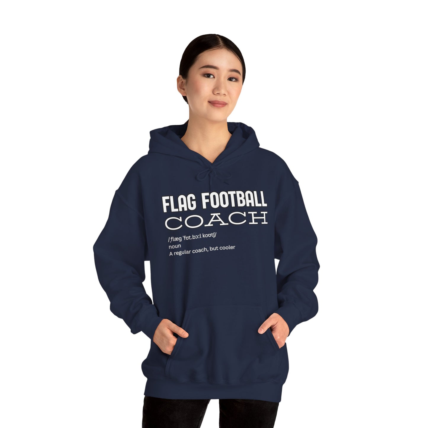Asian female model front view in navy hoodie with white "Flag Football Coach" print, hands in pockets
