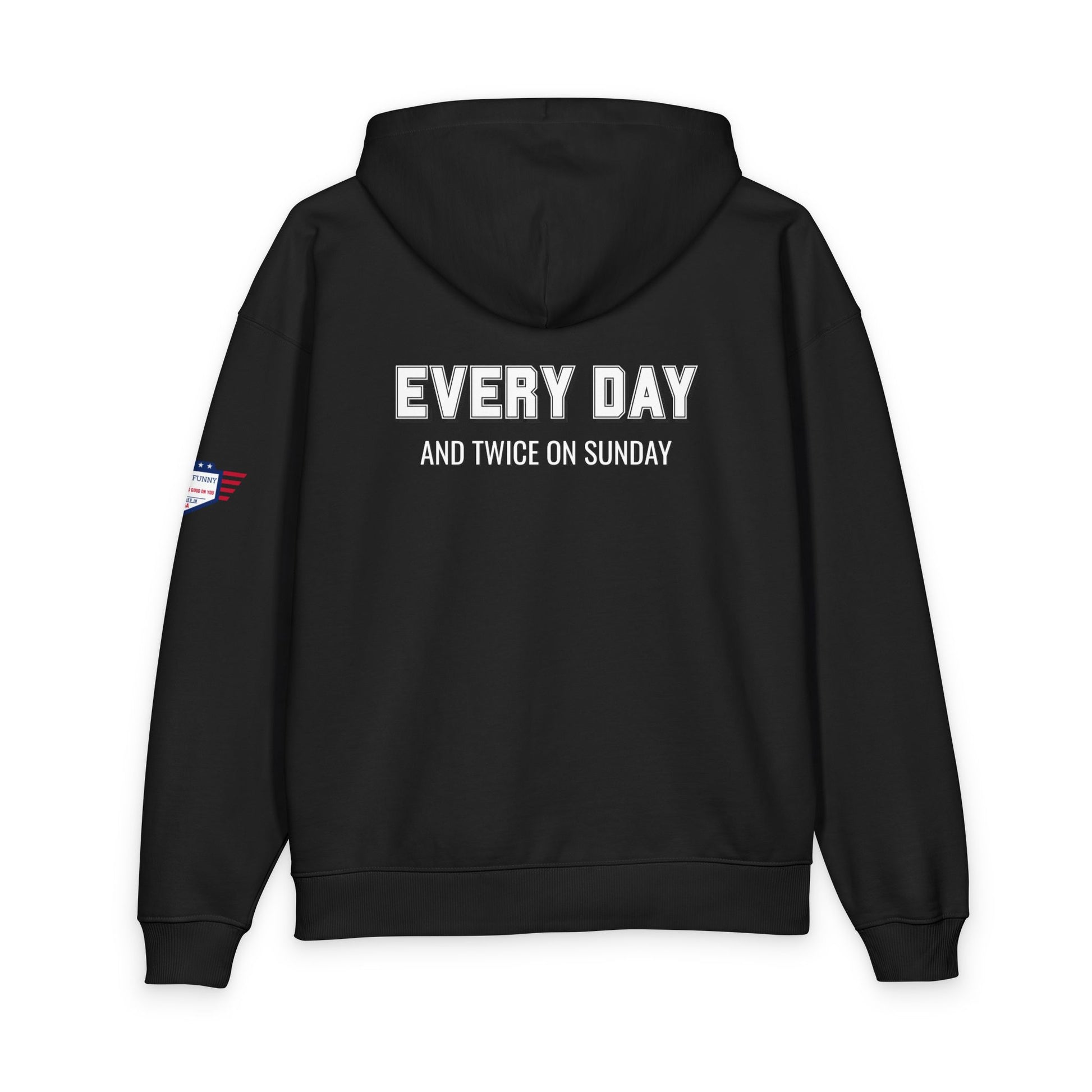 Back view black hoodie displaying "EVERY DAY AND TWICE ON SUNDAY" in white plus US flag on sleeve
