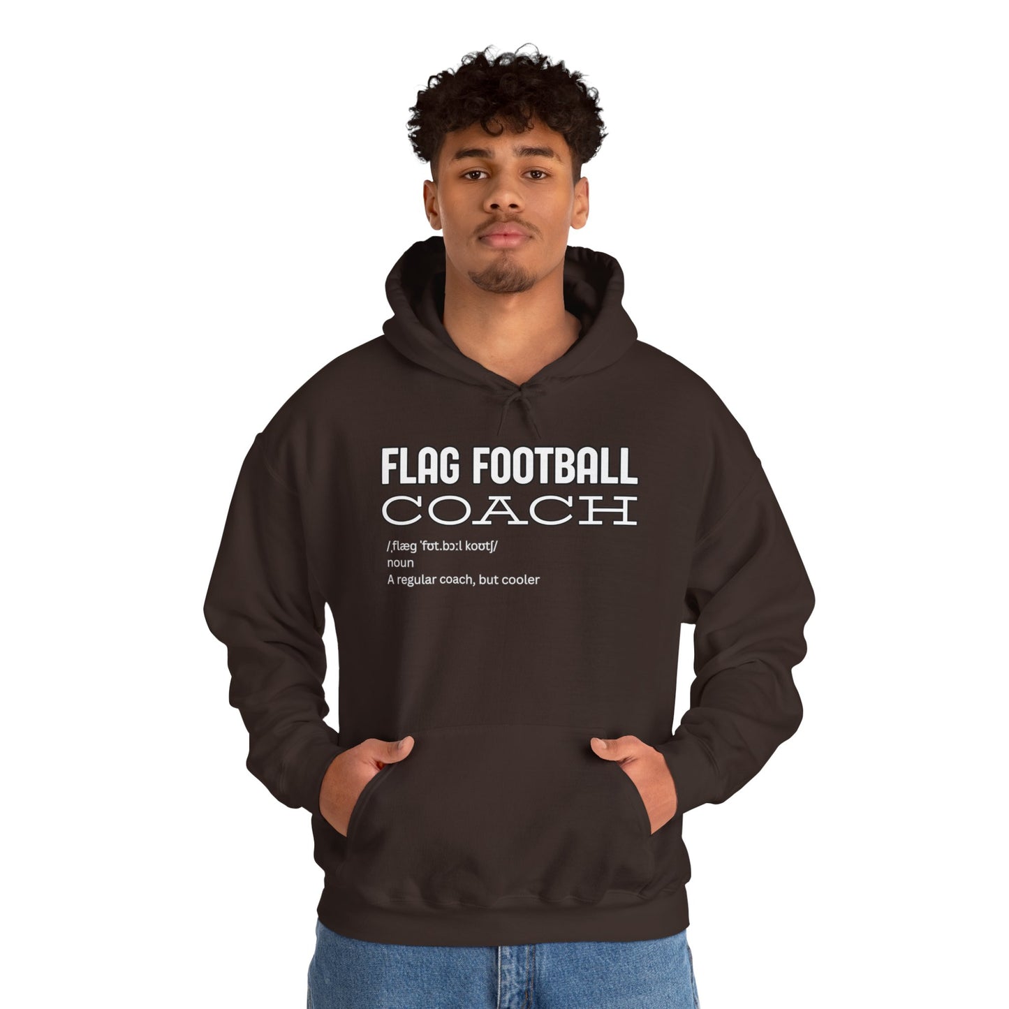 Male model with curly hair in dark chocolate Flag Football Coach hoodie, front print visible