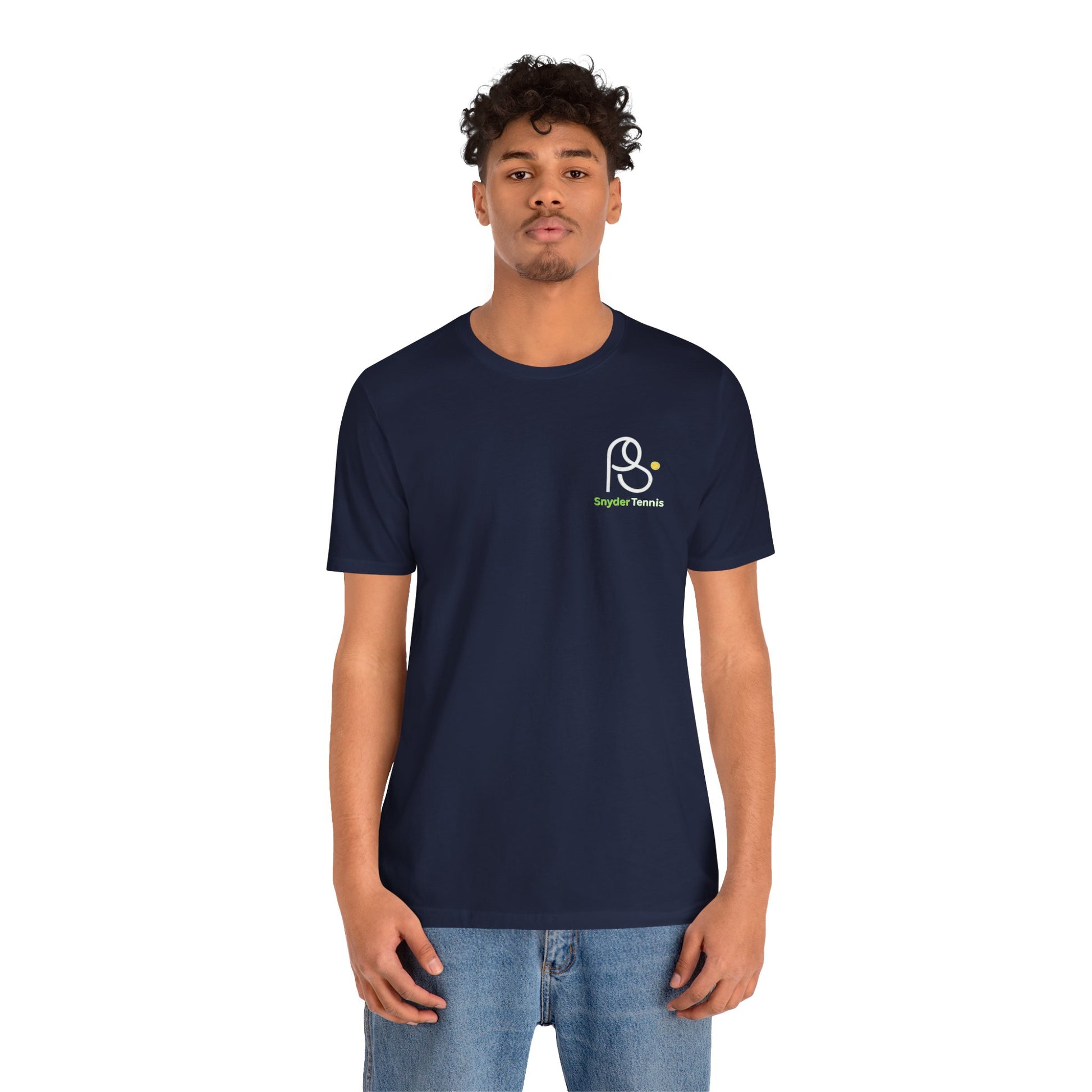 Male model front view in navy Coach Pete Snyder tee, "PⓈ Snyder Tennis" chest print, relaxed jeans vibe