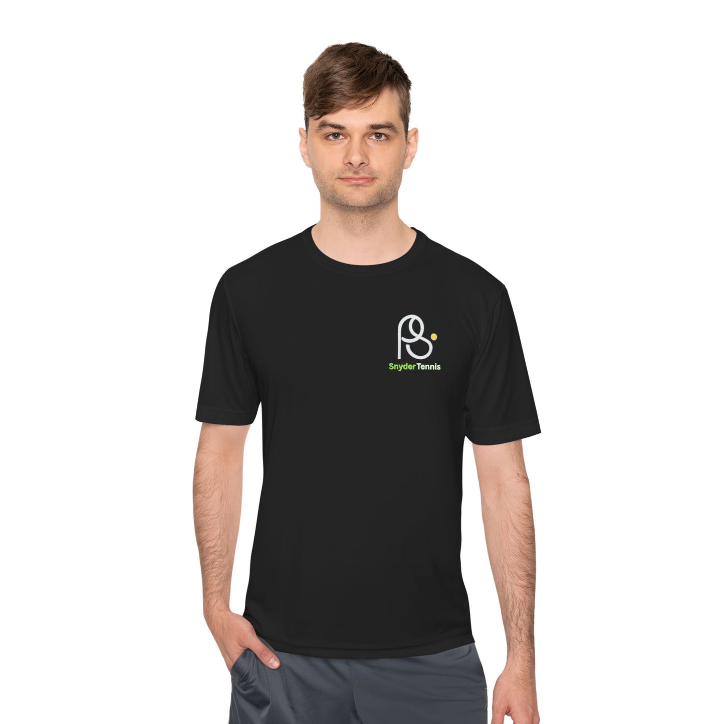 Male model serving black tee front look, white "P S" graphic and green "Brighton Tennis" text