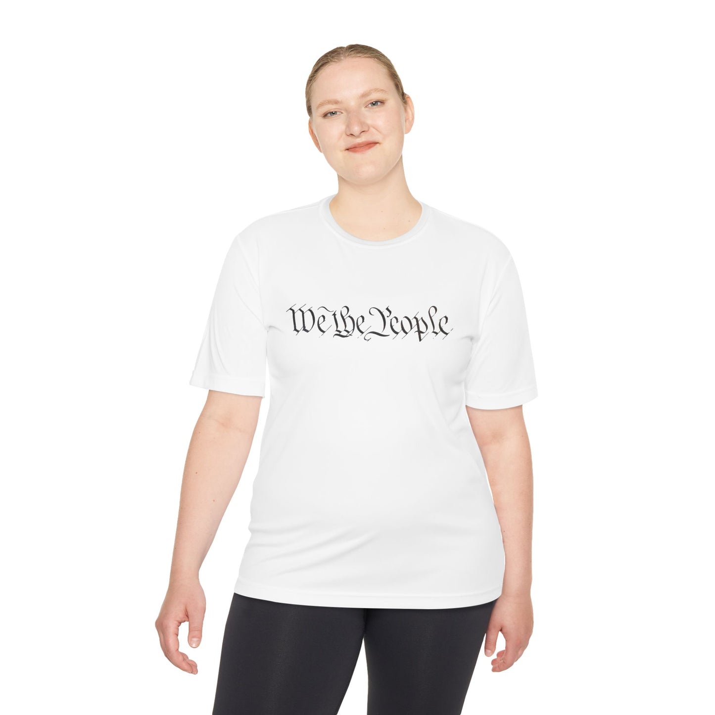 Female model rocking white moisture-wicking tee with dark "We the People" script, casual pose