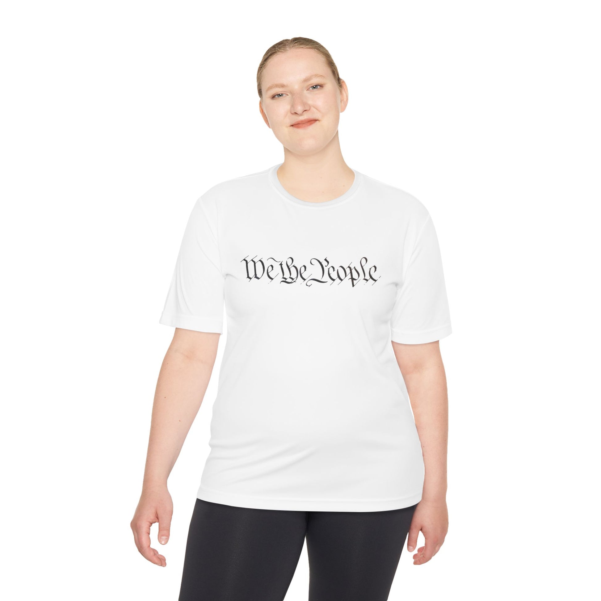 Female model rocking white moisture-wicking tee with dark "We the People" script, casual pose