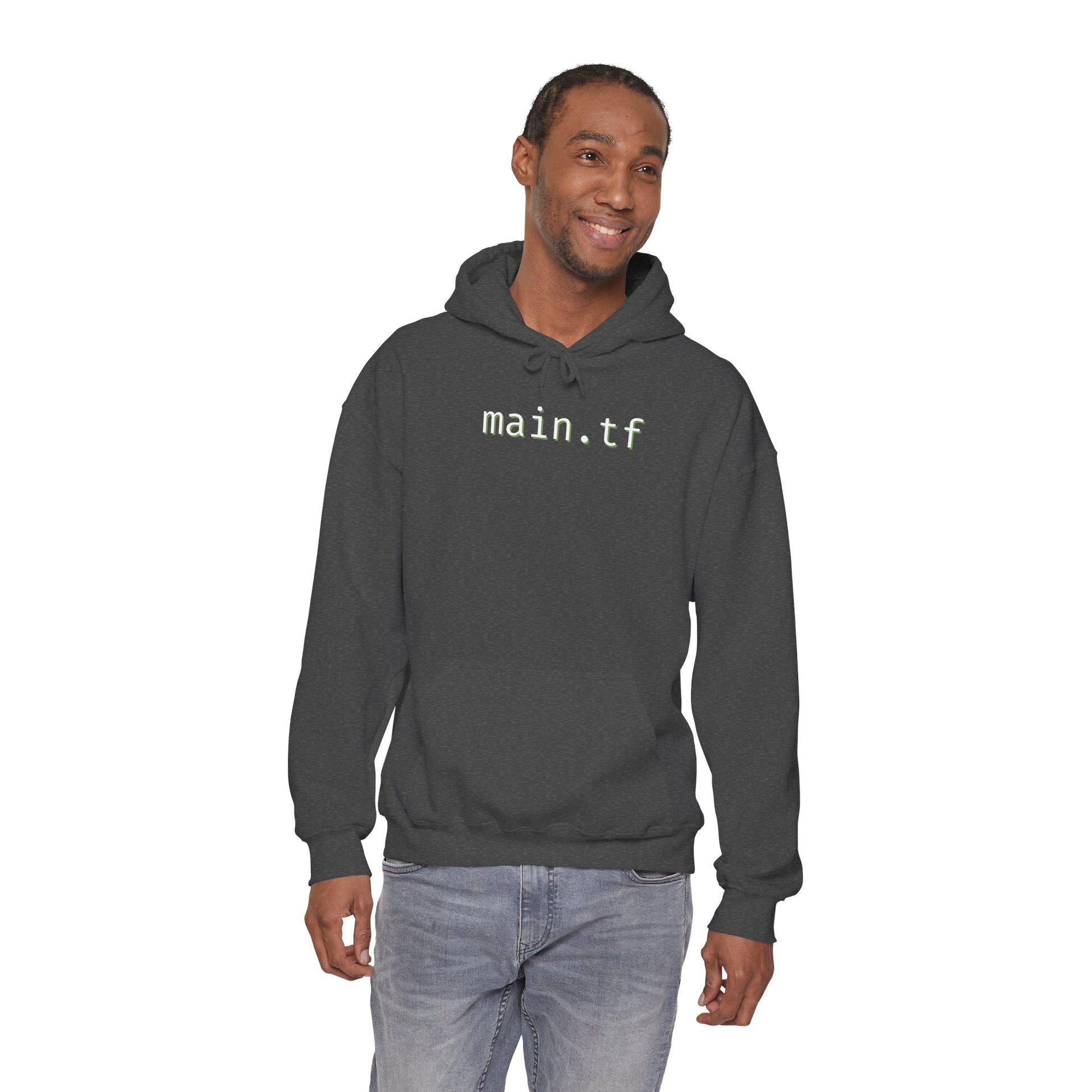 Smiling man models front of dark heather gray hoodie, "main.tf" in light cyan, jeans