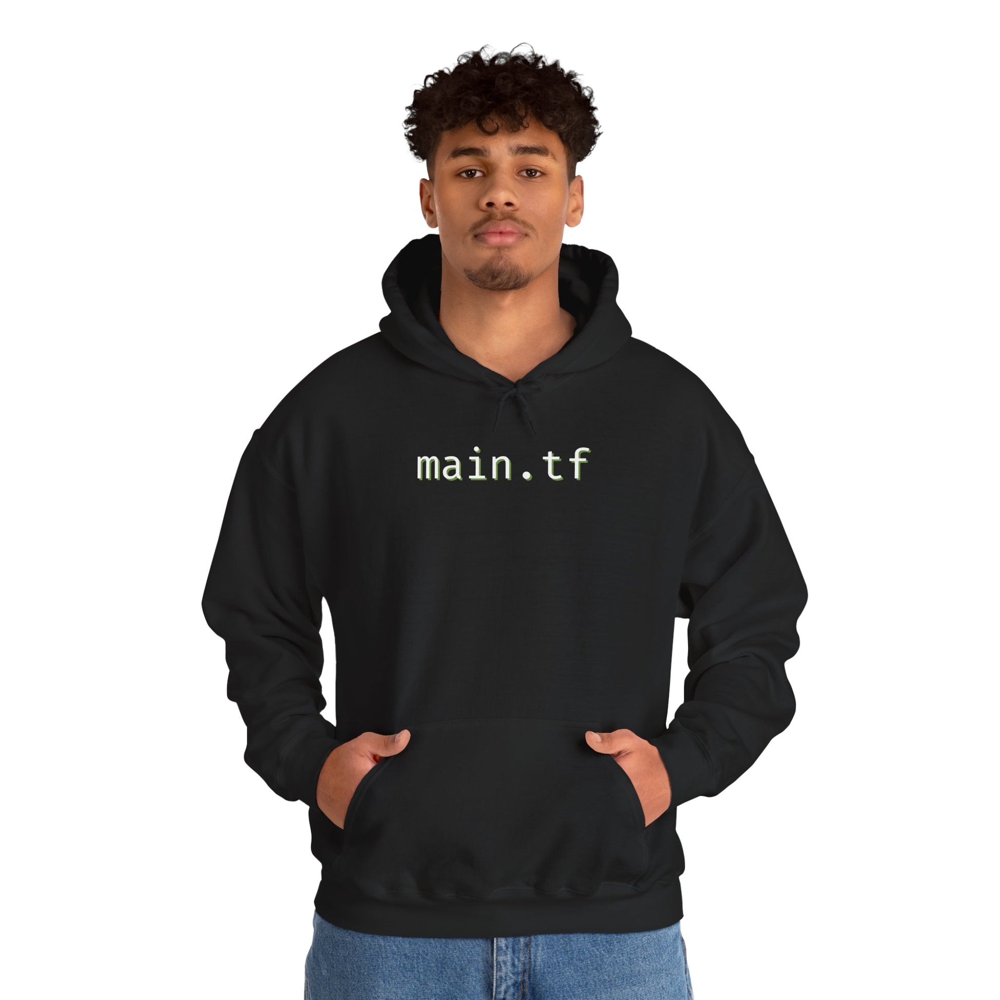 Asian woman model in black "main.tf" hoodie, hands in pockets, casual pose