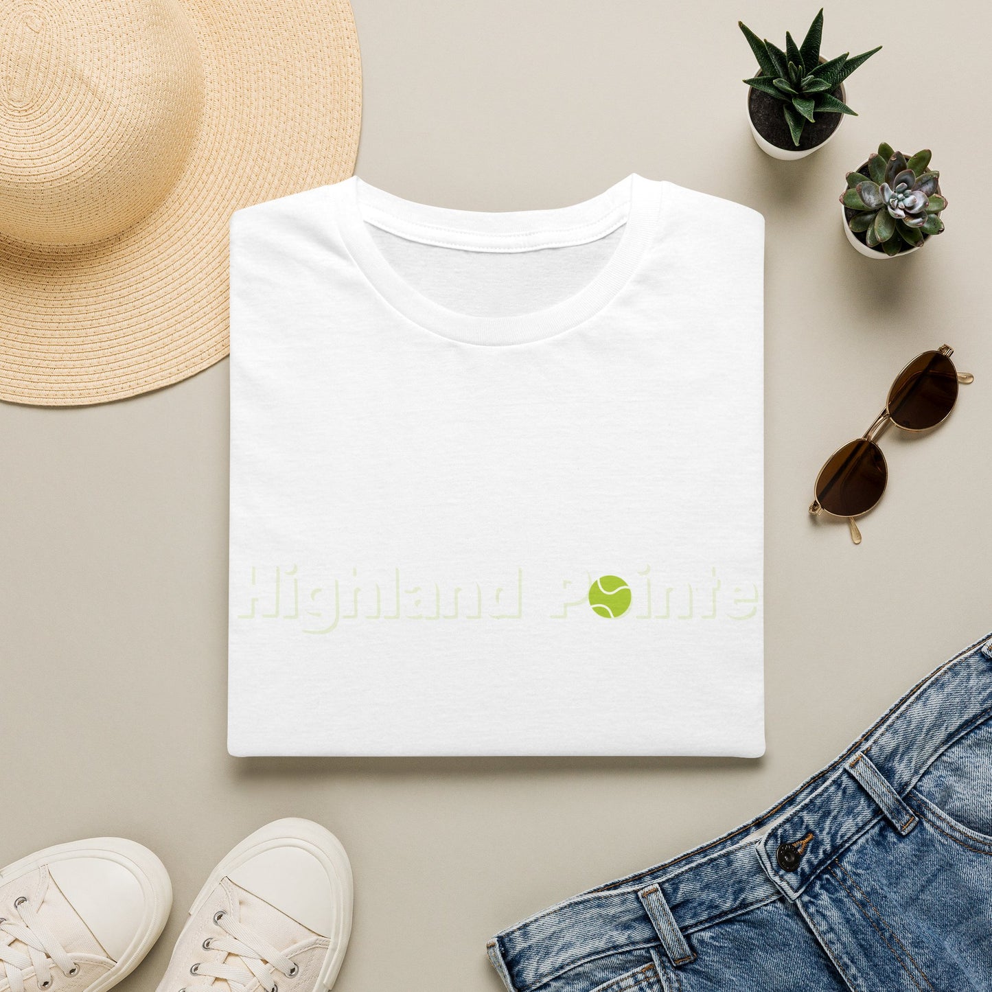 T-Shirt — Minimal 'Highland Smile' Logo Tee (Small Green Emblem)