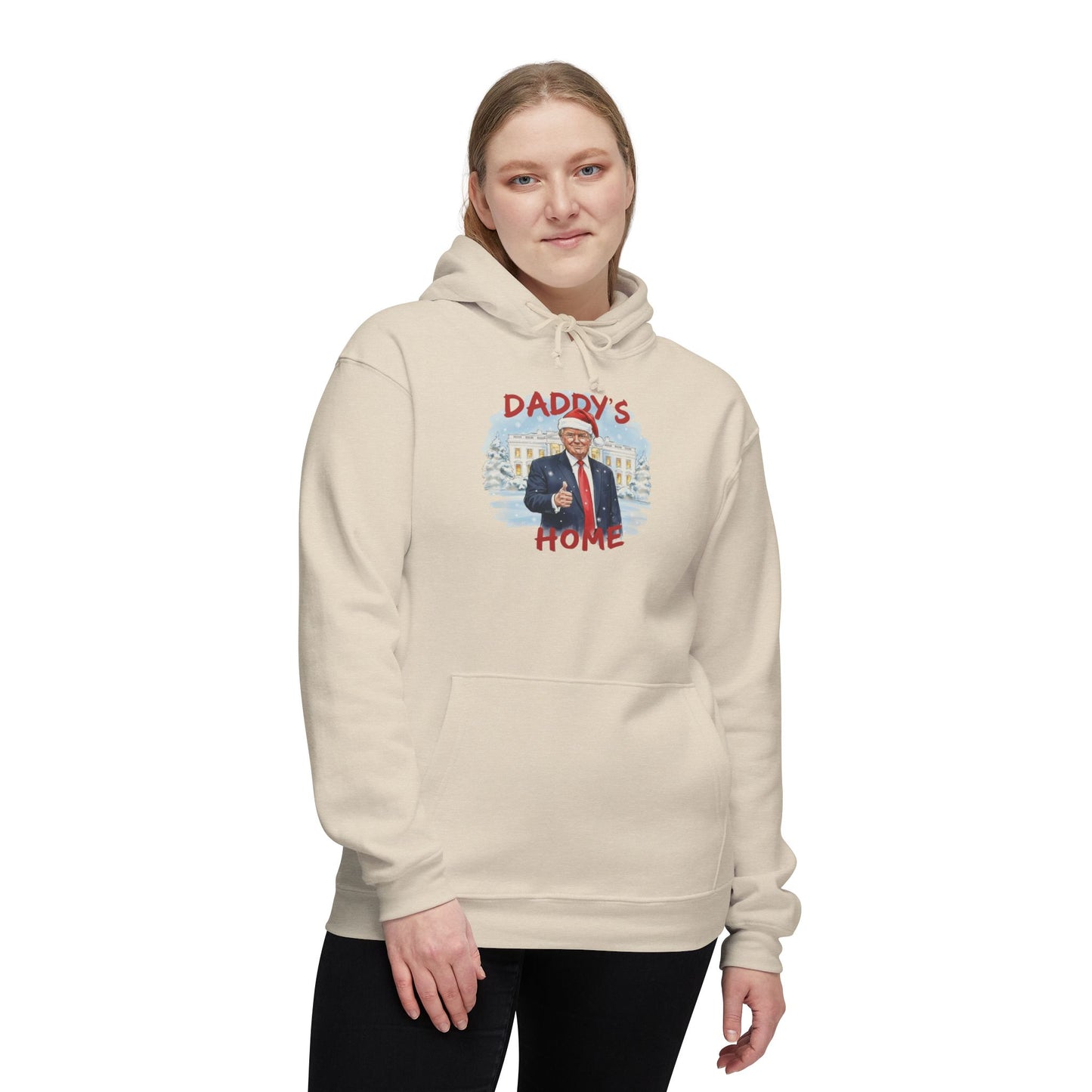 Woman wearing cream "Daddy's Home" front hoodie with Trump in Santa hat and winter White House