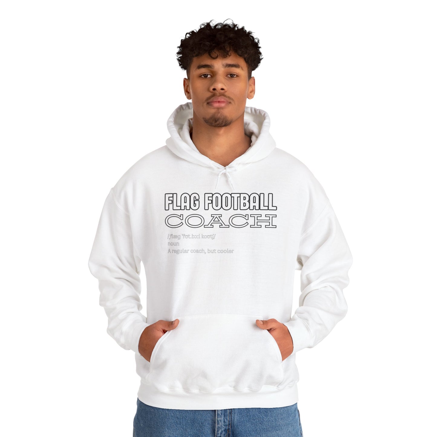 Curly-haired guy rocking front view of white "Flag Football Coach: Like a Regular Coach but Cooler" hoodie