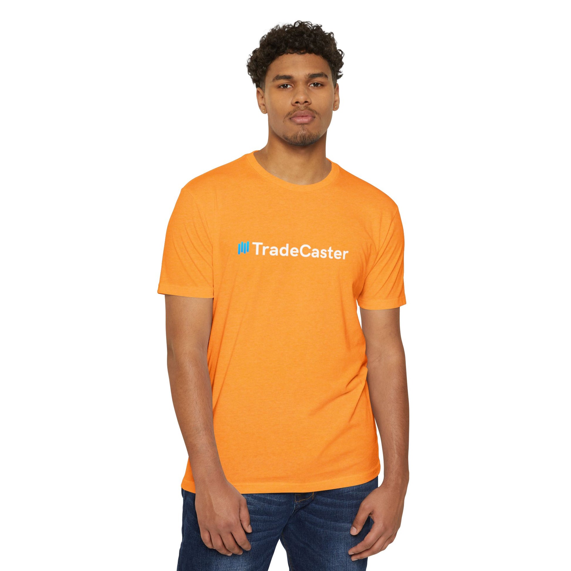Male model front view wearing orange TradeCaster CVC t-shirt, blue logo, relaxed jeans stance