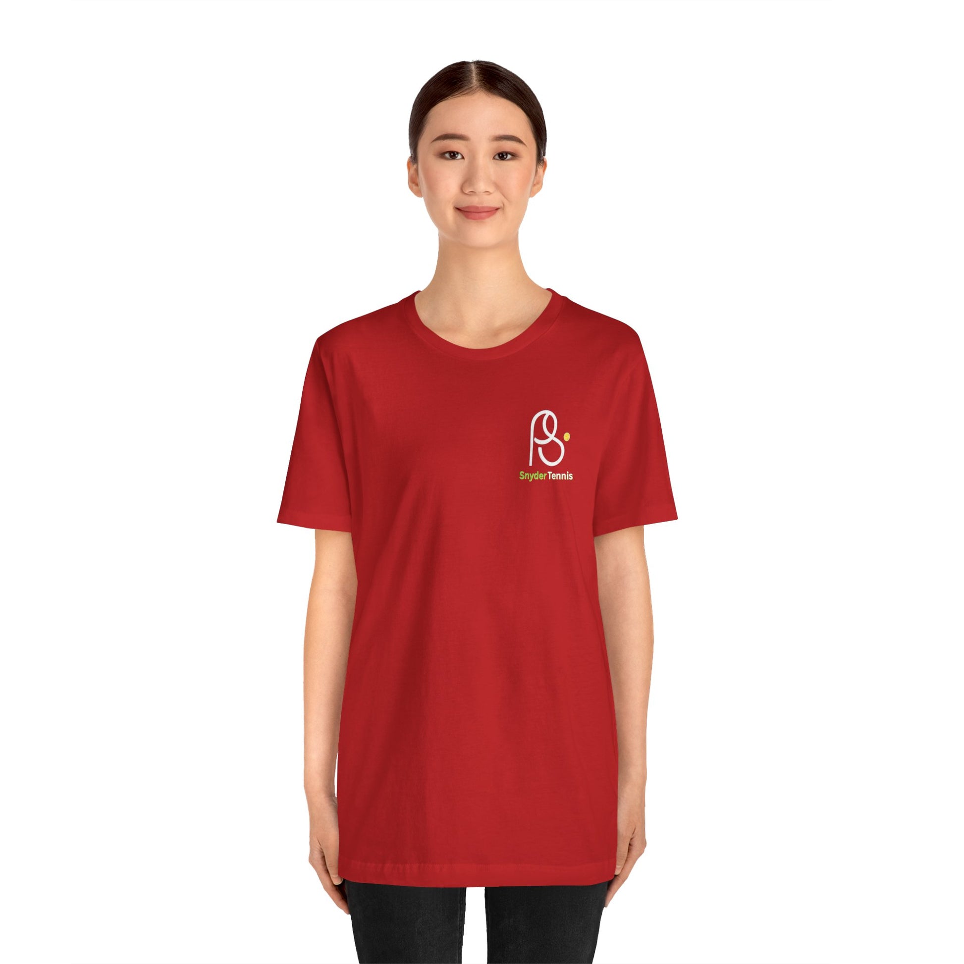 Female model front view rocking red Coach Pete Snyder tennis tee, subtle white PS logo and yellow Harrison on chest