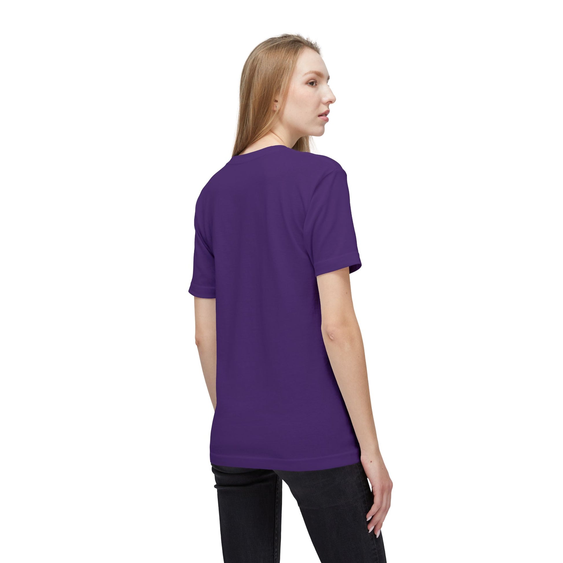Back view of model in purple tee over jeans — peacemaker's subtle side