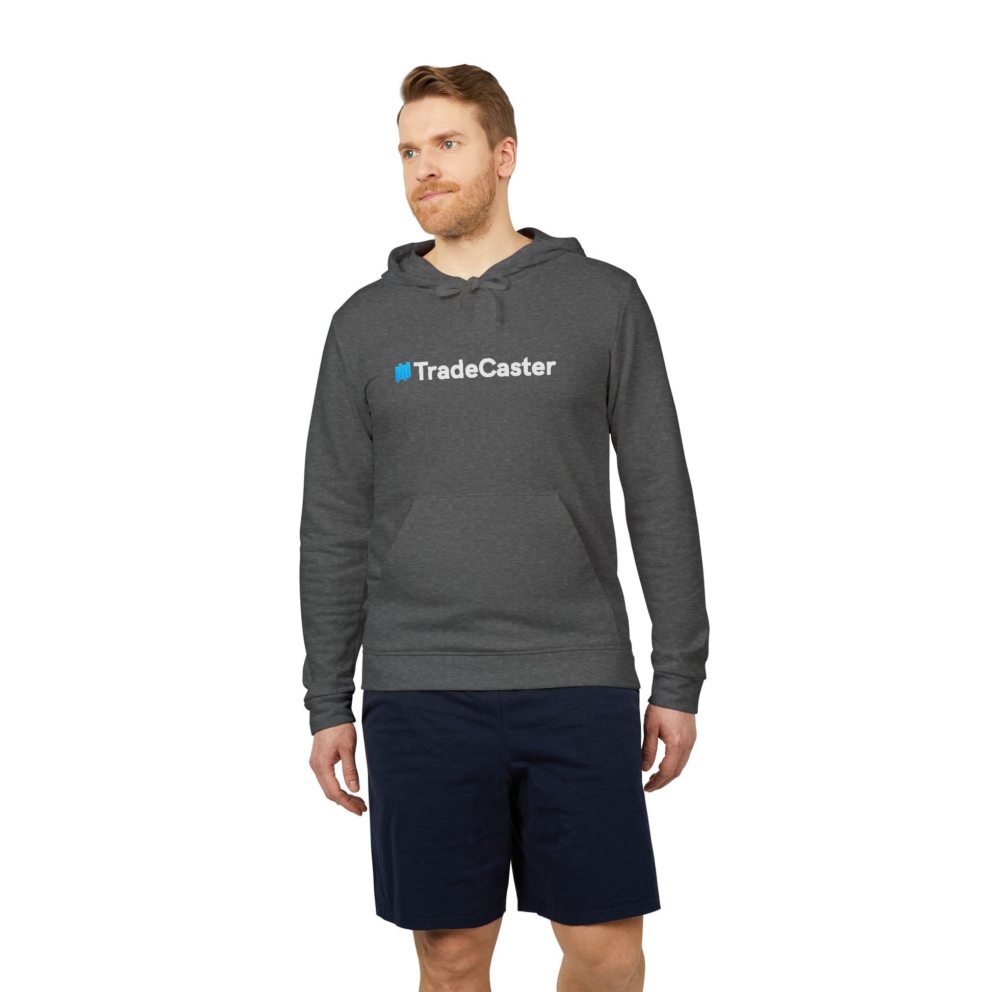 Ginger dude models front-left view of grey heather TradeCaster Adidas fleece hoodie, blue-accented logo pops on chest