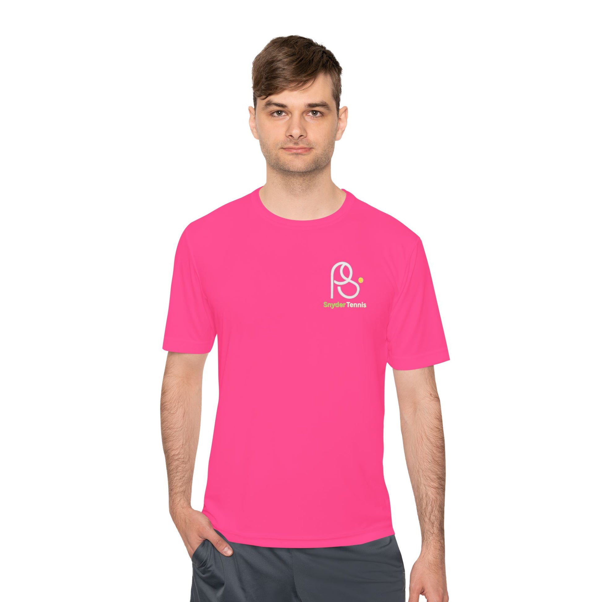 Man modeling hot pink tee, PS Bridge Tennis logo in white and green on chest
