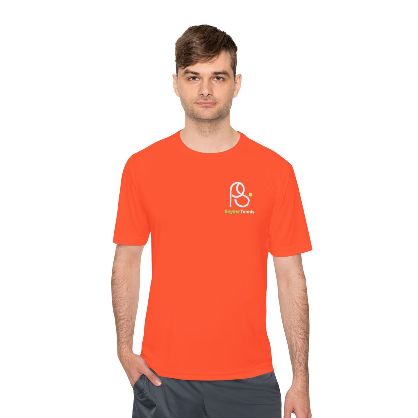 Male model in orange short-sleeve tee, front displaying white "P S" and green "Brighton Tennis"