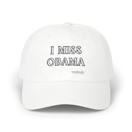 Front view of white dad hat with black "I MISS OBAMA -nobody" embroidery, unstructured cotton vibes