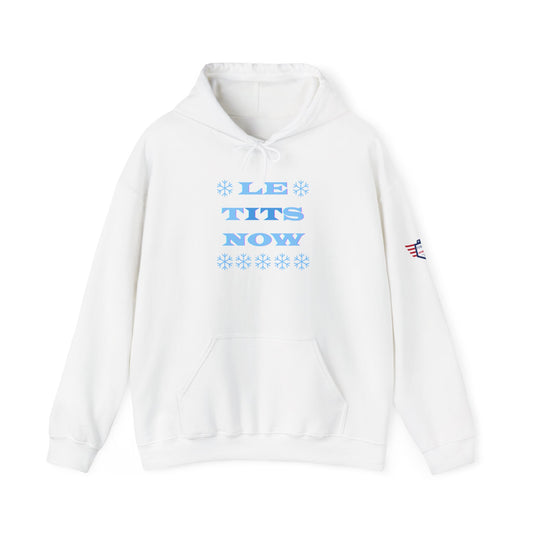 Front view of white unisex hoodie with light blue "LET TITS NOW" snowflake pun print and USA flag sleeve patch