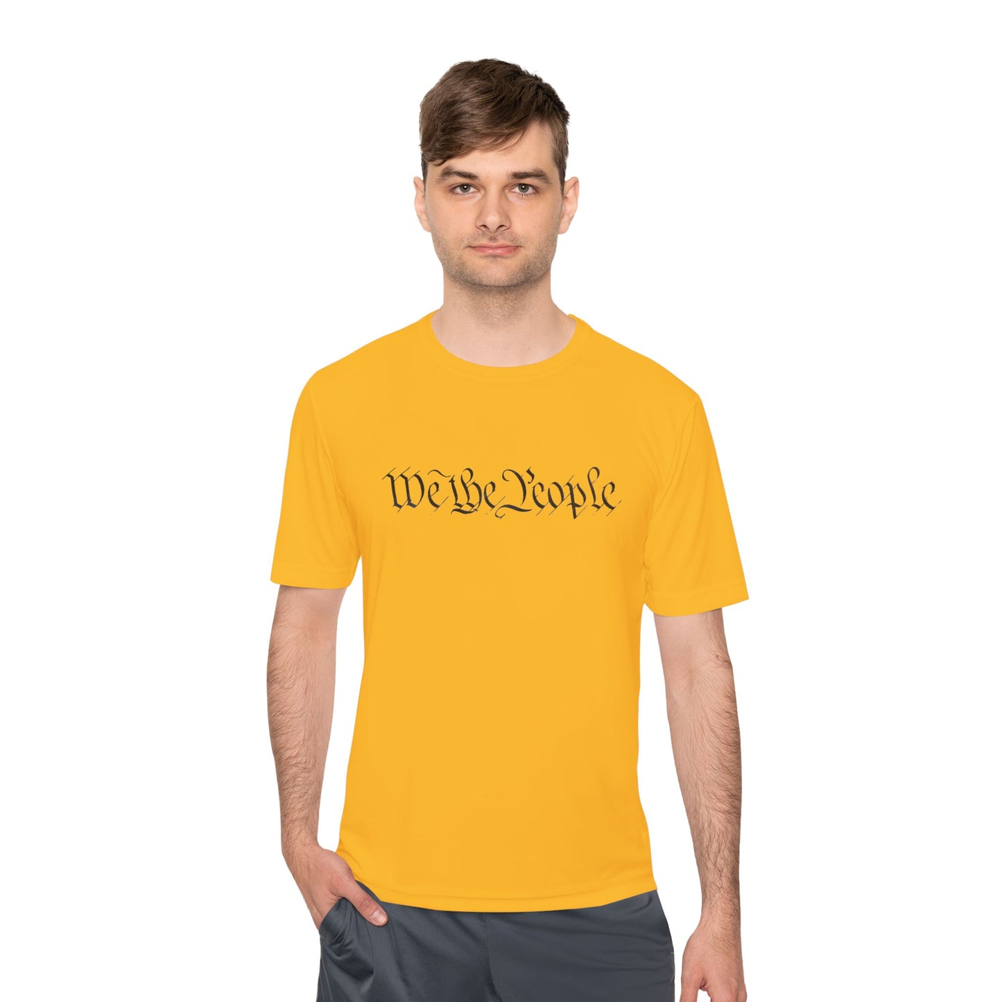 Male model in bright yellow tee, front view black "We the People" script ready to scan